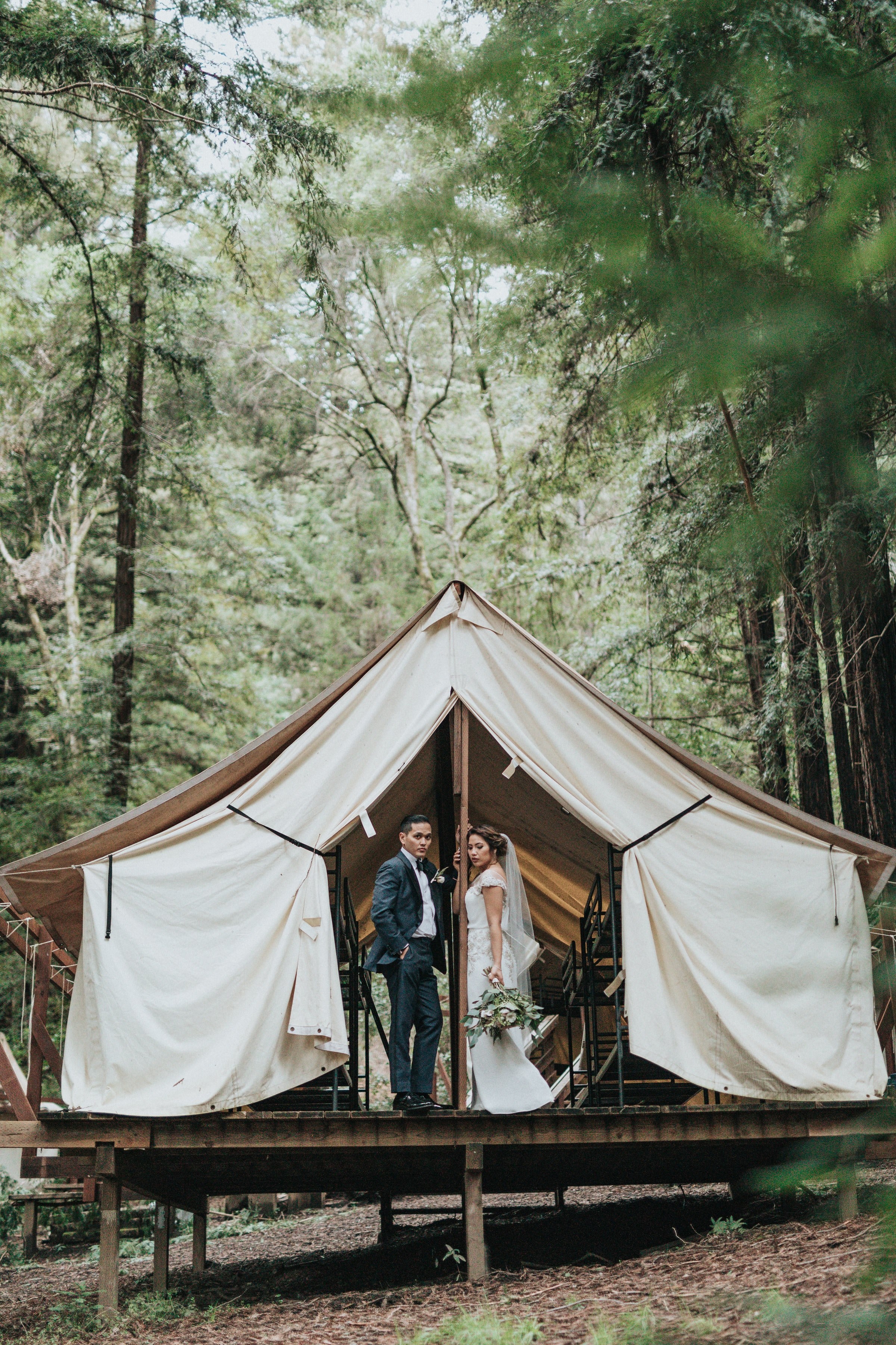 the flaps of a tent in the woods are opened to reveal a married couple in wedding wear, wedding in the woods 4k, Phone HD Wallpaper