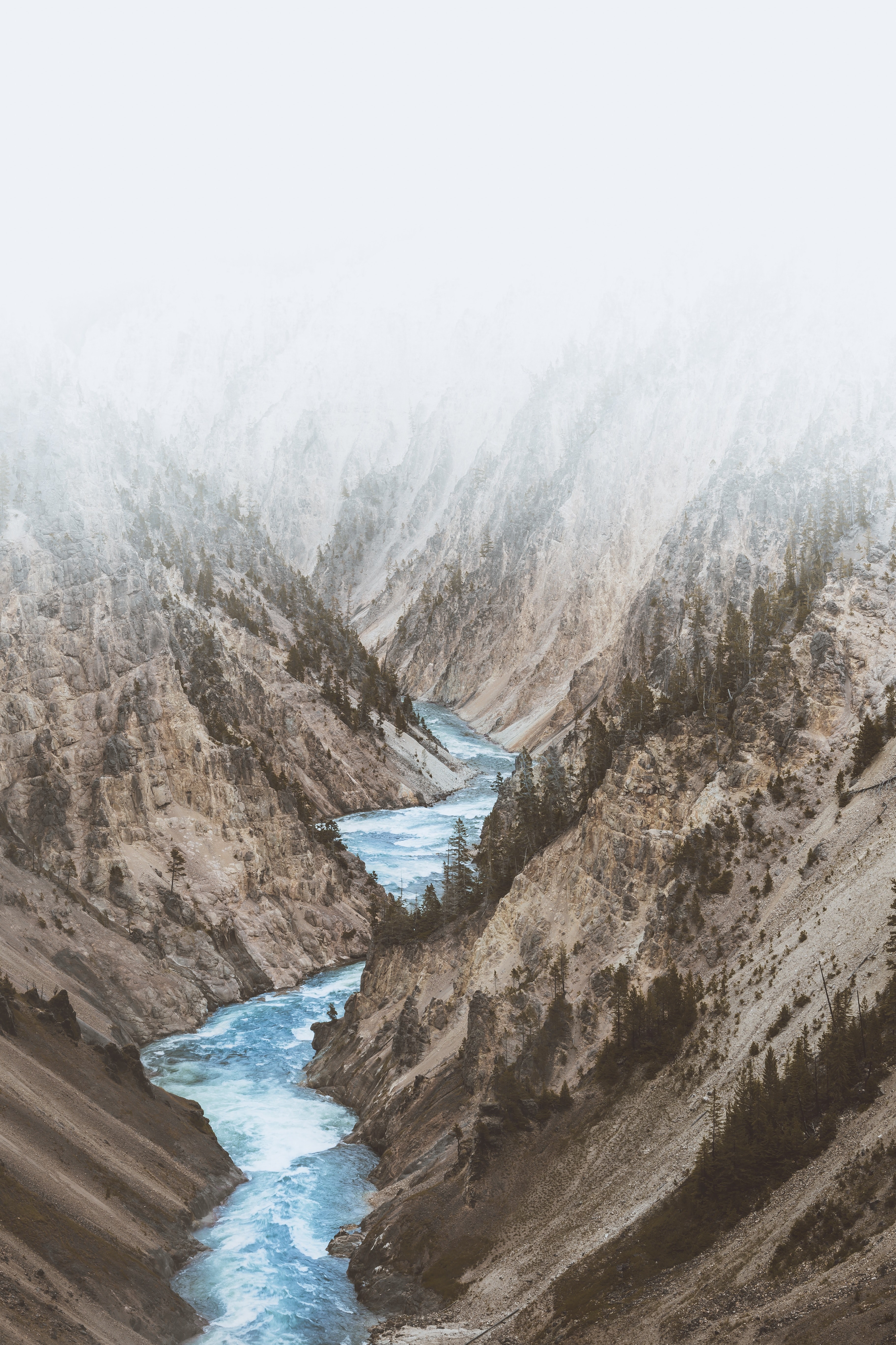 a river rushes through the valley of deserted mountain sides in yellowstone, whos in for a boat ride 4k, Phone HD Wallpaper