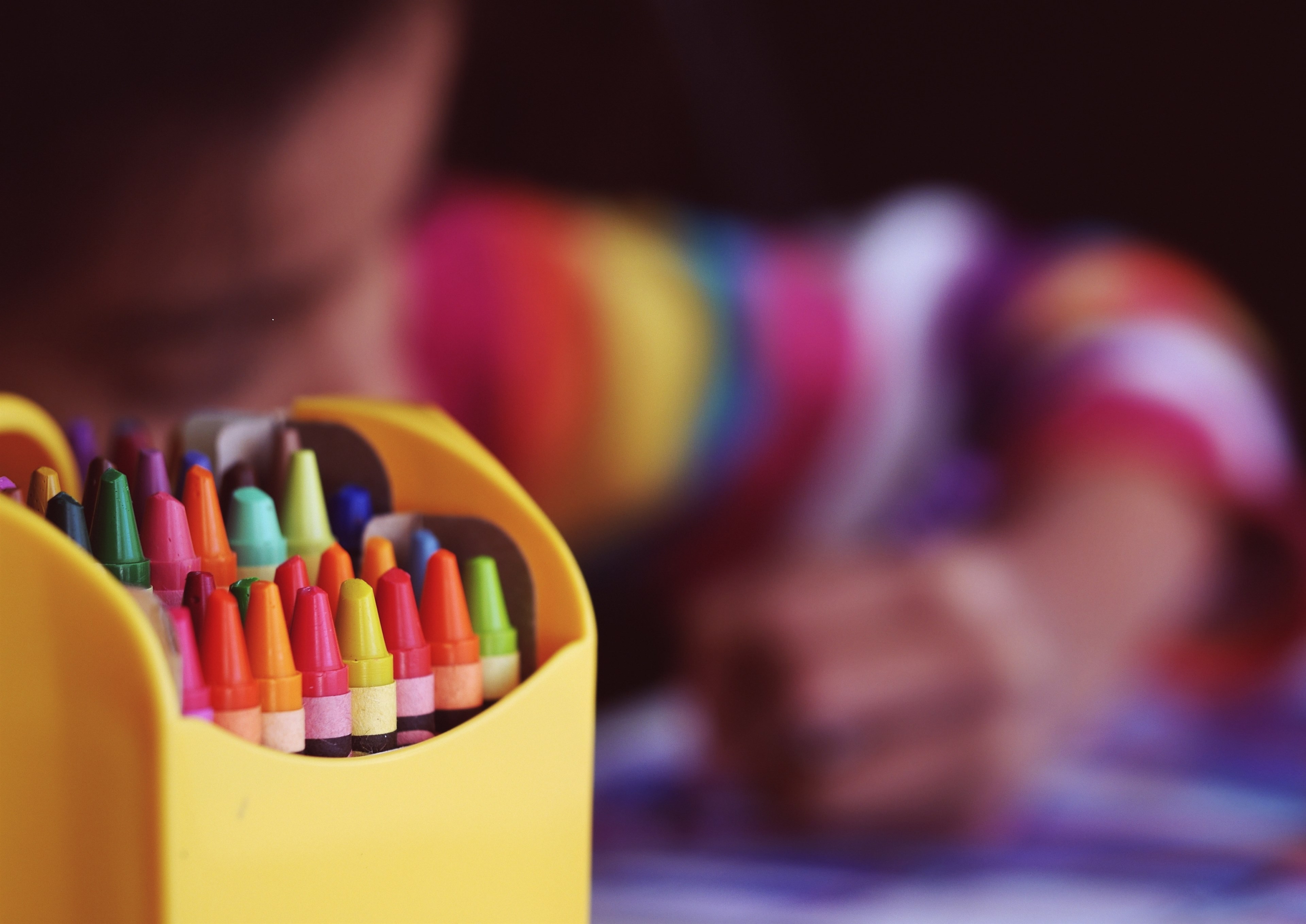 a child wearing a colorful shirt uses crayons to color a picture, _crayons beside child coloring 4k, HD Wallpaper