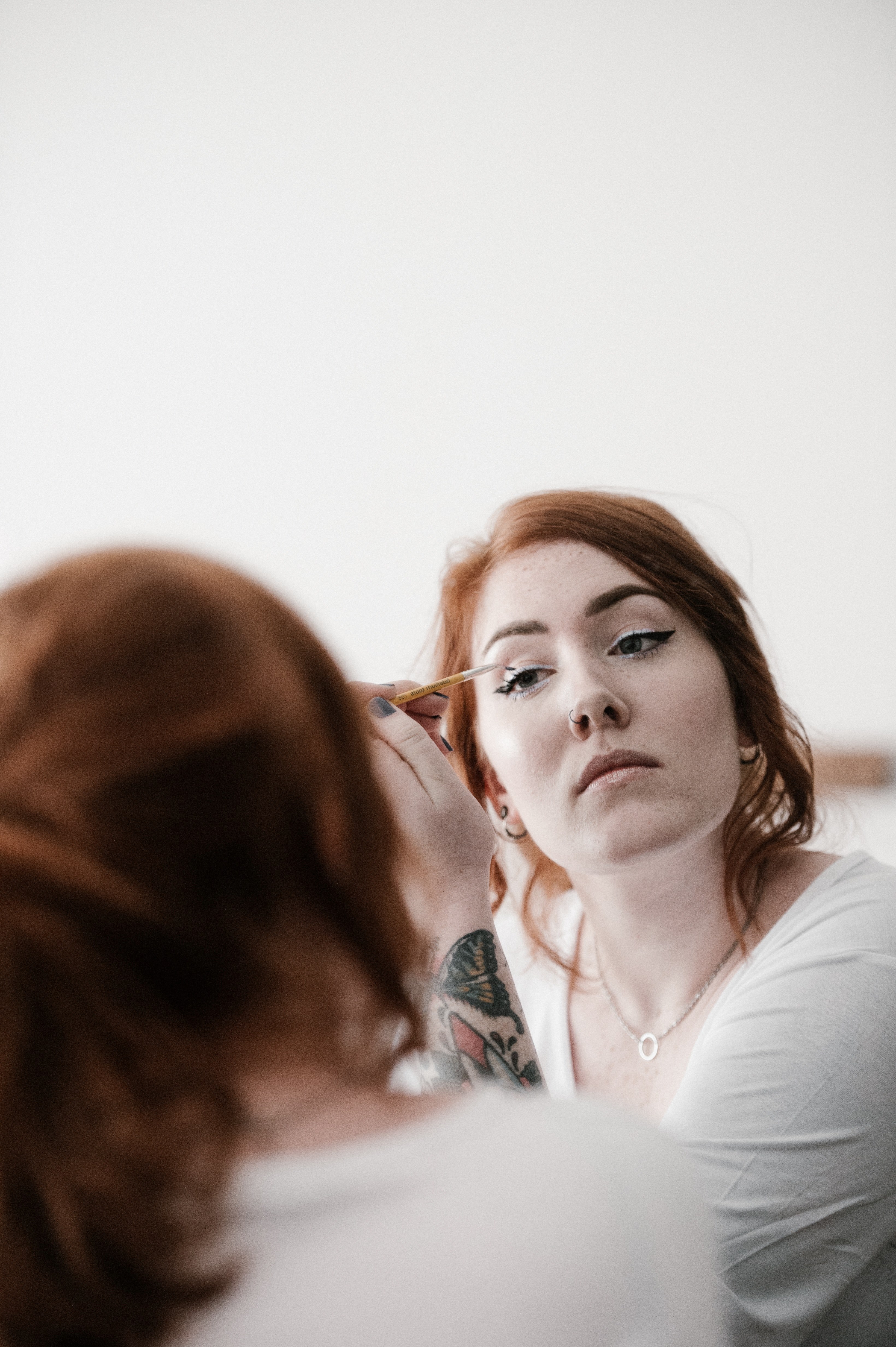 woman applying eye liner make up 4k, Phone HD Wallpaper