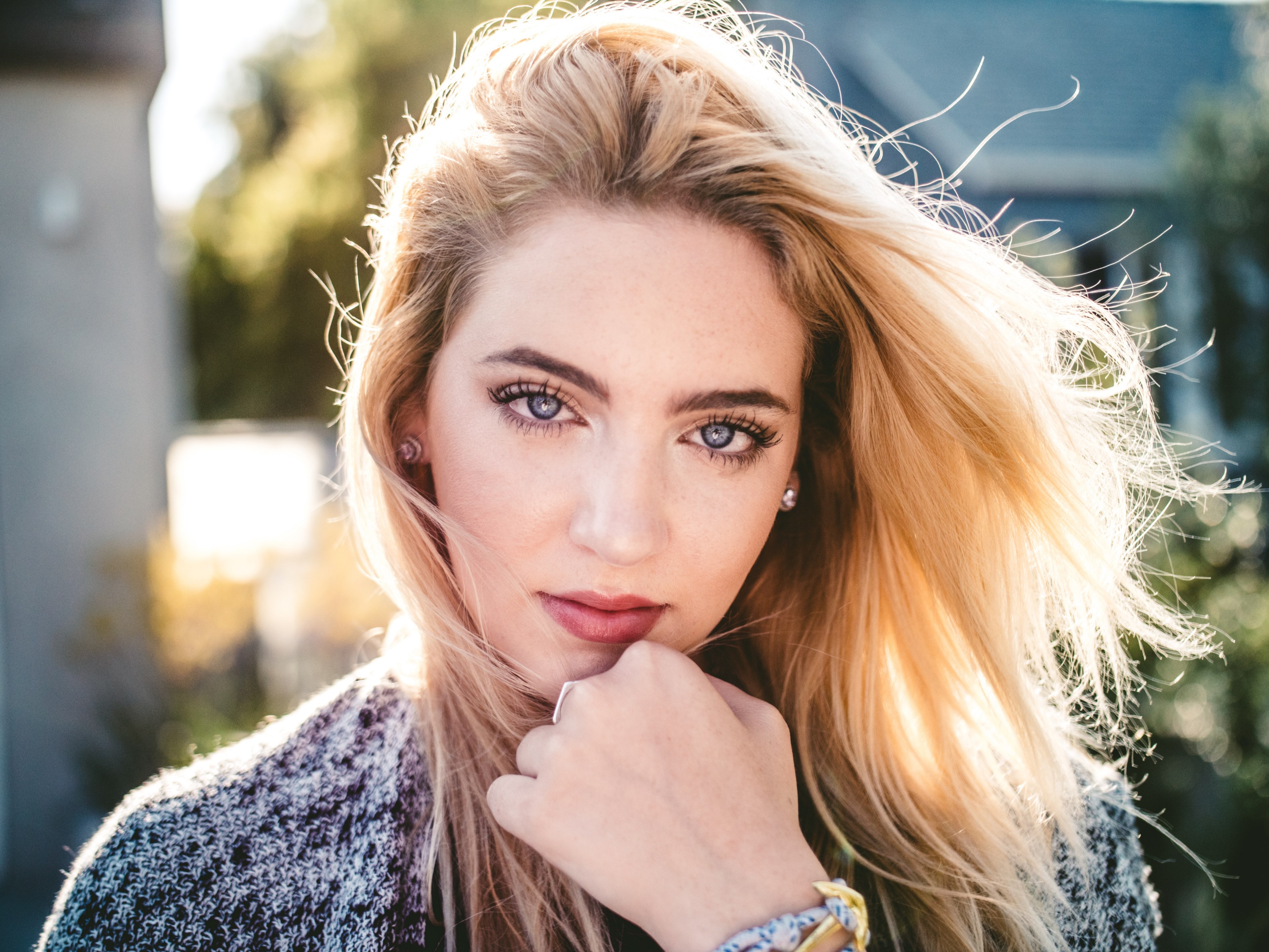 young woman with hair blowing in the wind looks shy, tell me something i dont know 4k, HD Wallpaper