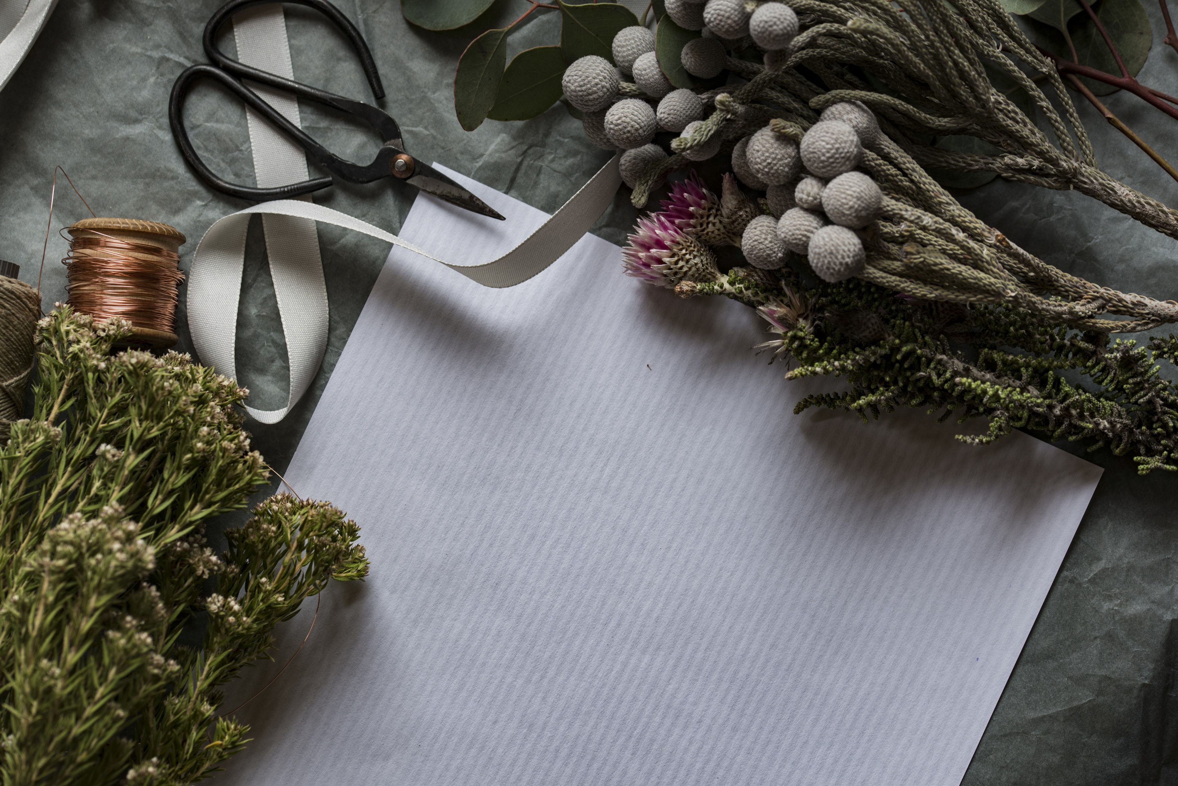 an overhead shot of wrapping paper and a ribbon next to cut flowers, flowers 4k, HD Wallpaper