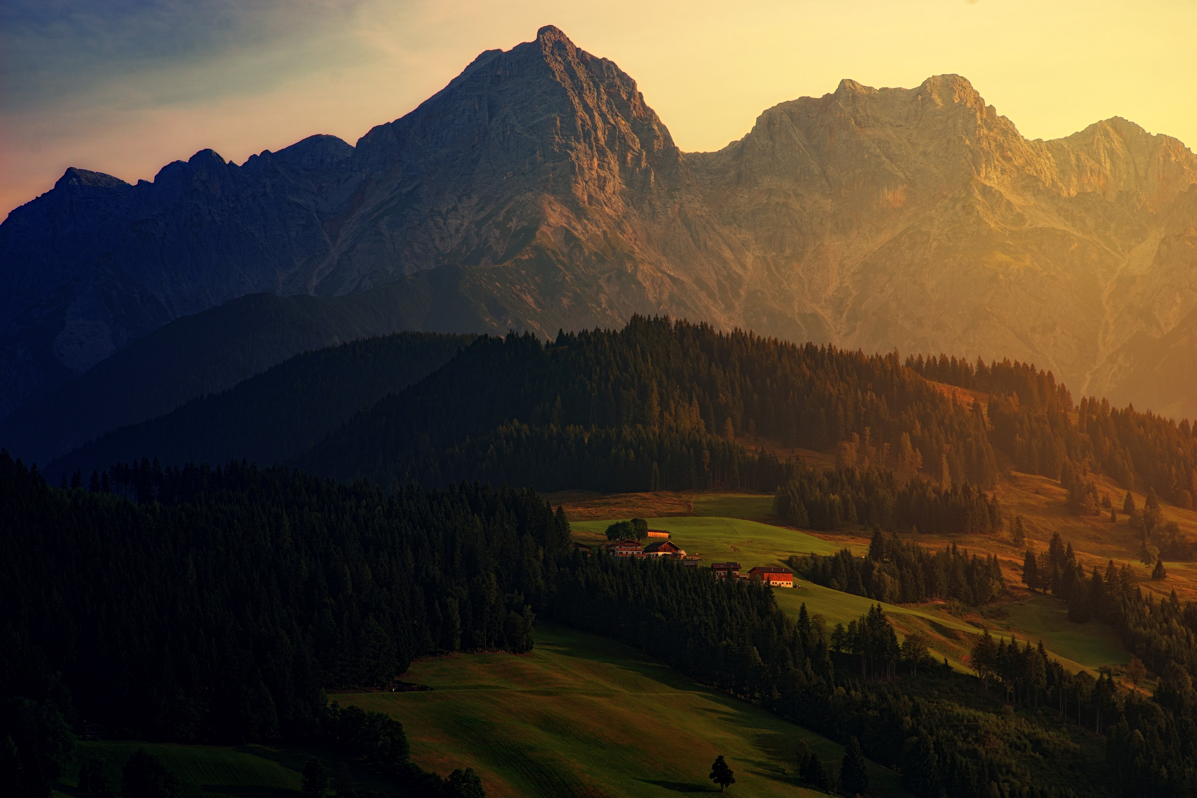 rugged mountains towering over a rural area, mountain village during golden hour 4k, HD Wallpaper