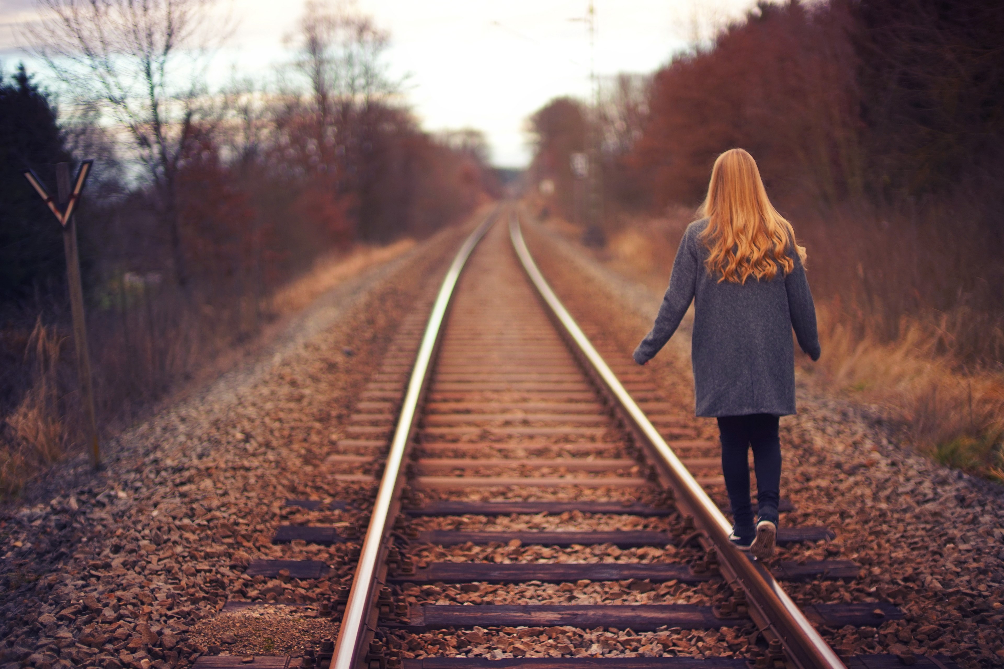 woman walking walk and train track 4k, HD Wallpaper
