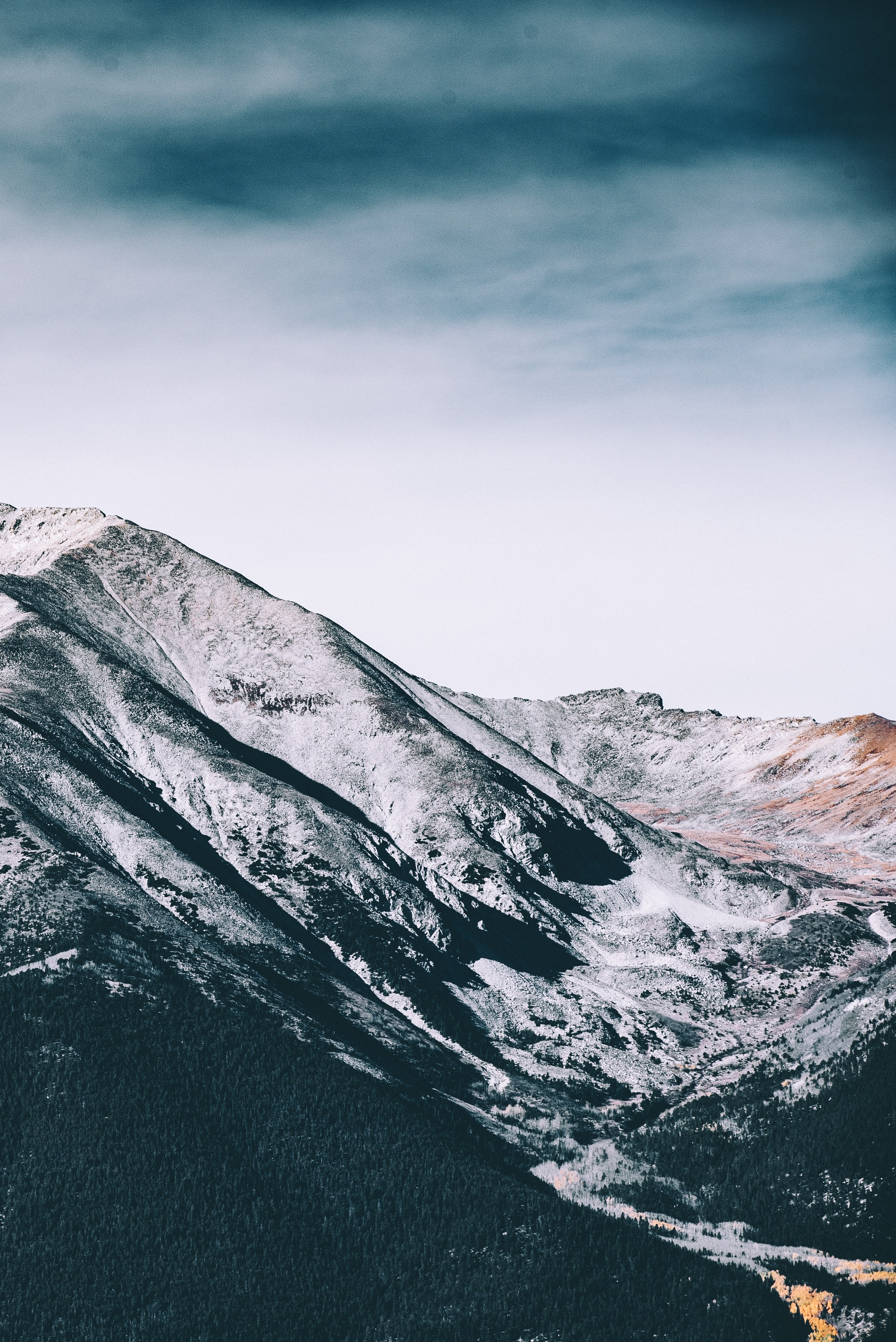 snowy mountain landscape under a cloudy sky, snow on mountains 4k, Phone HD Wallpaper