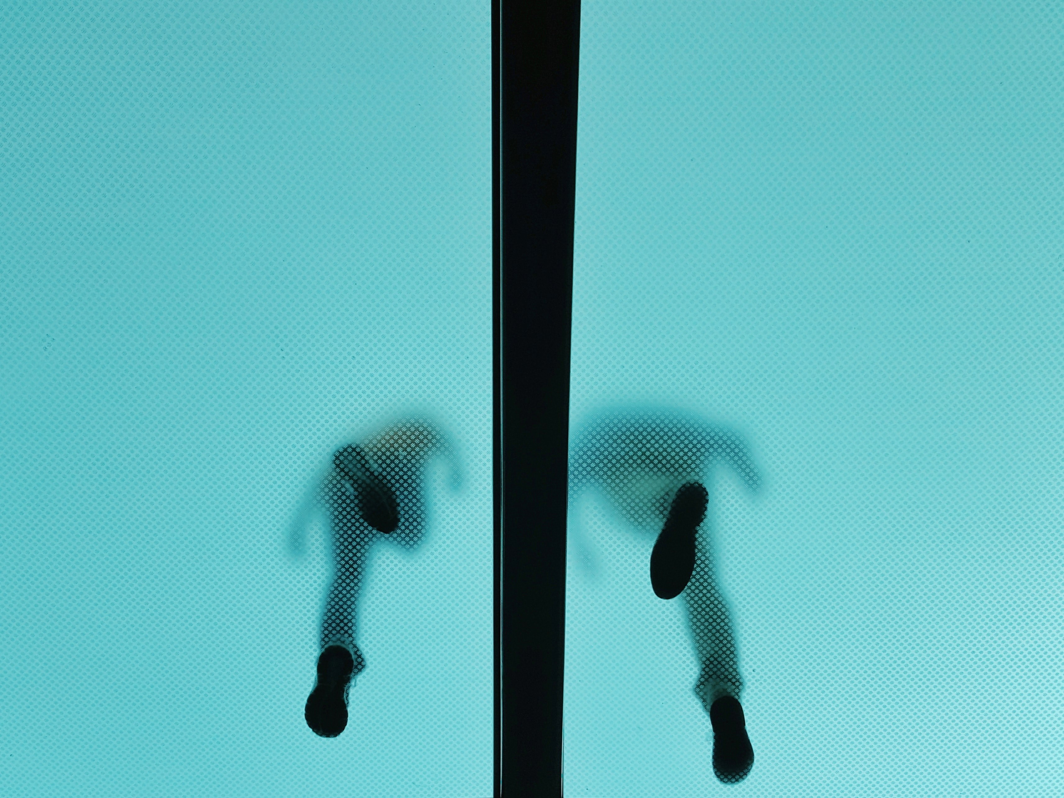 the shoeprints of two people walking on a level above seen through a translucent ceiling, feet on a translucent ceiling 4k, HD Wallpaper