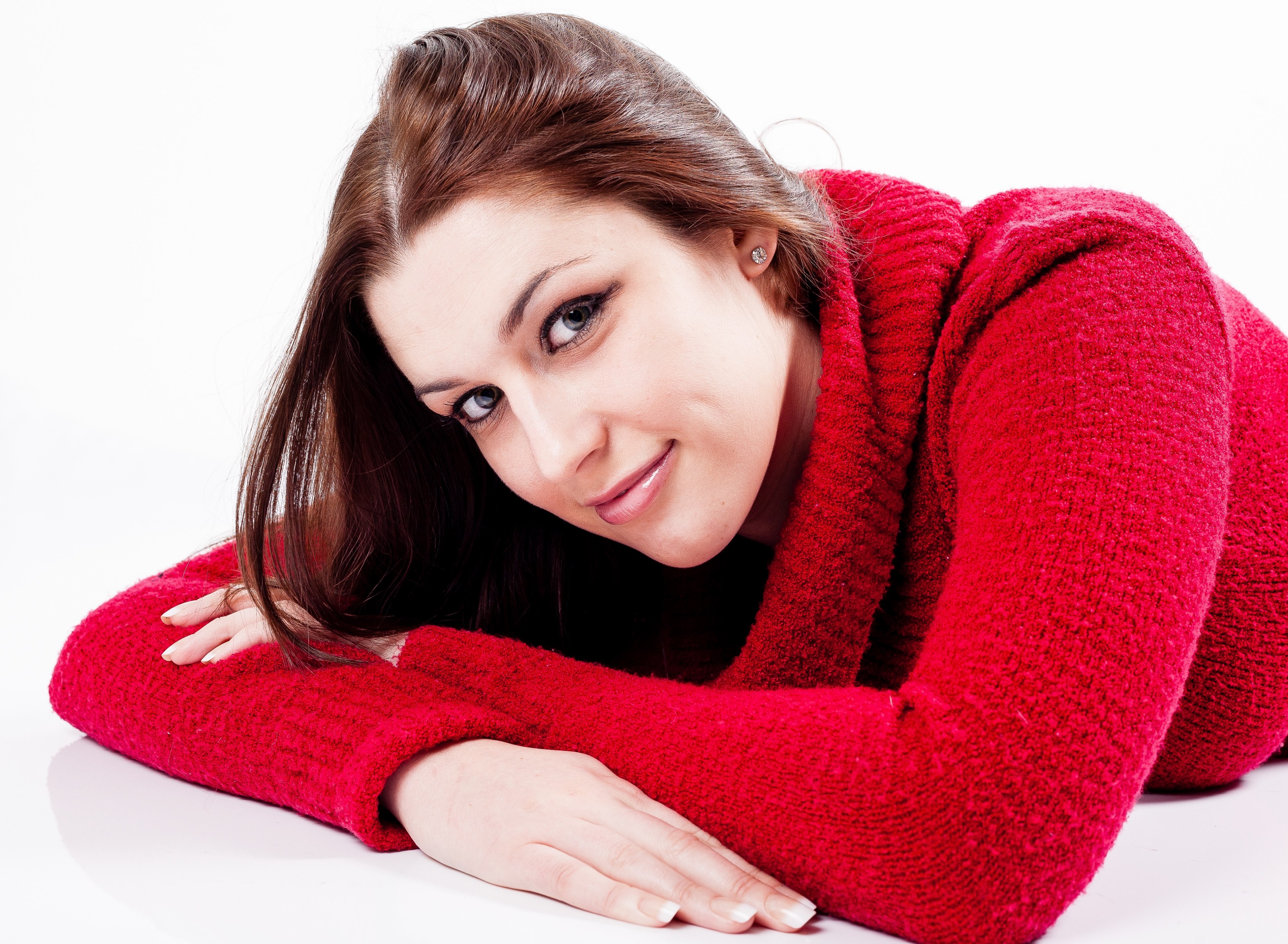 young woman female smiling lying down jumper red 4k, HD Wallpaper