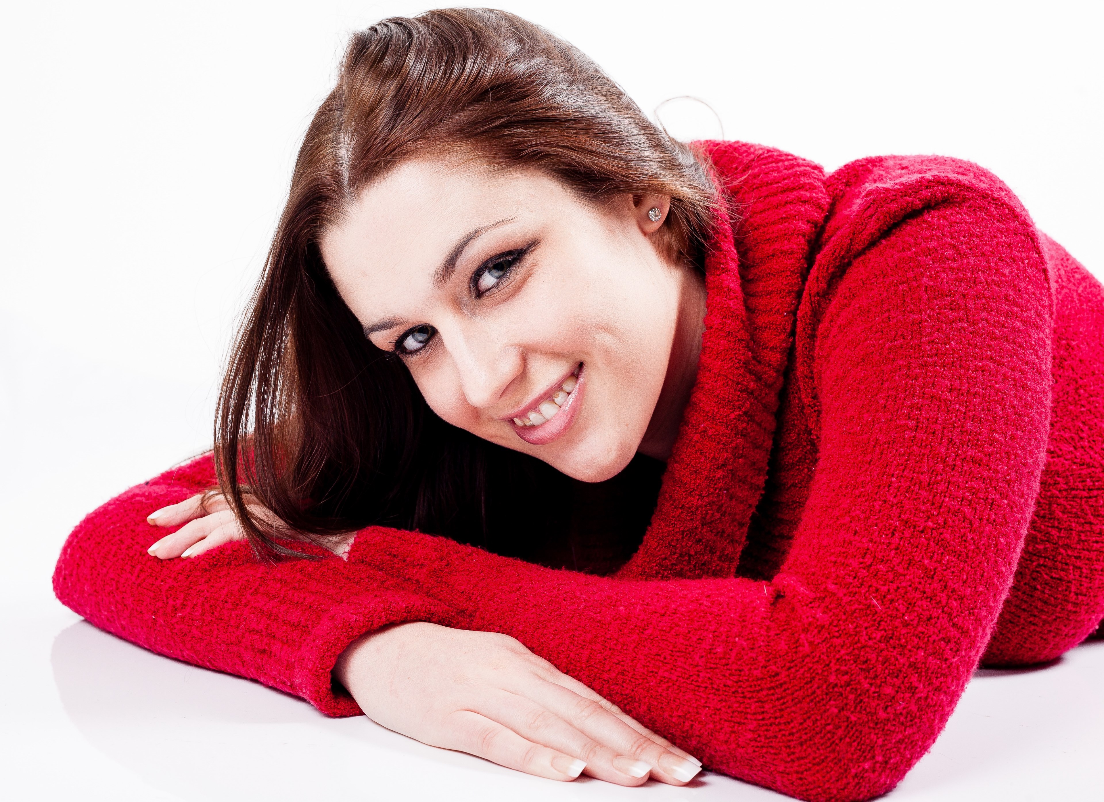 young woman female smiling lying down jumper red 4k, HD Wallpaper
