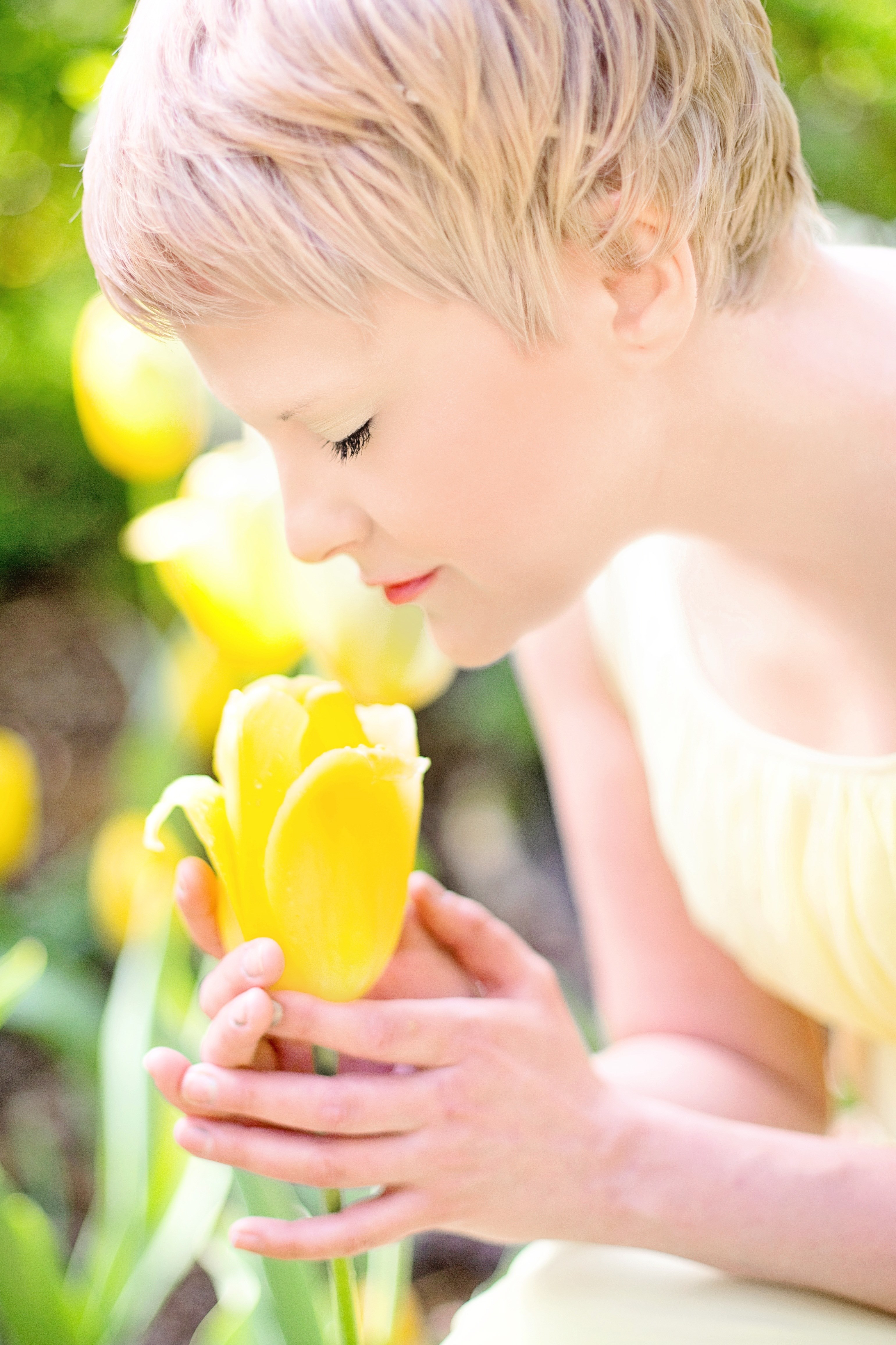 tulips yellow blonde pretty young woman spring 4k, Phone HD Wallpaper