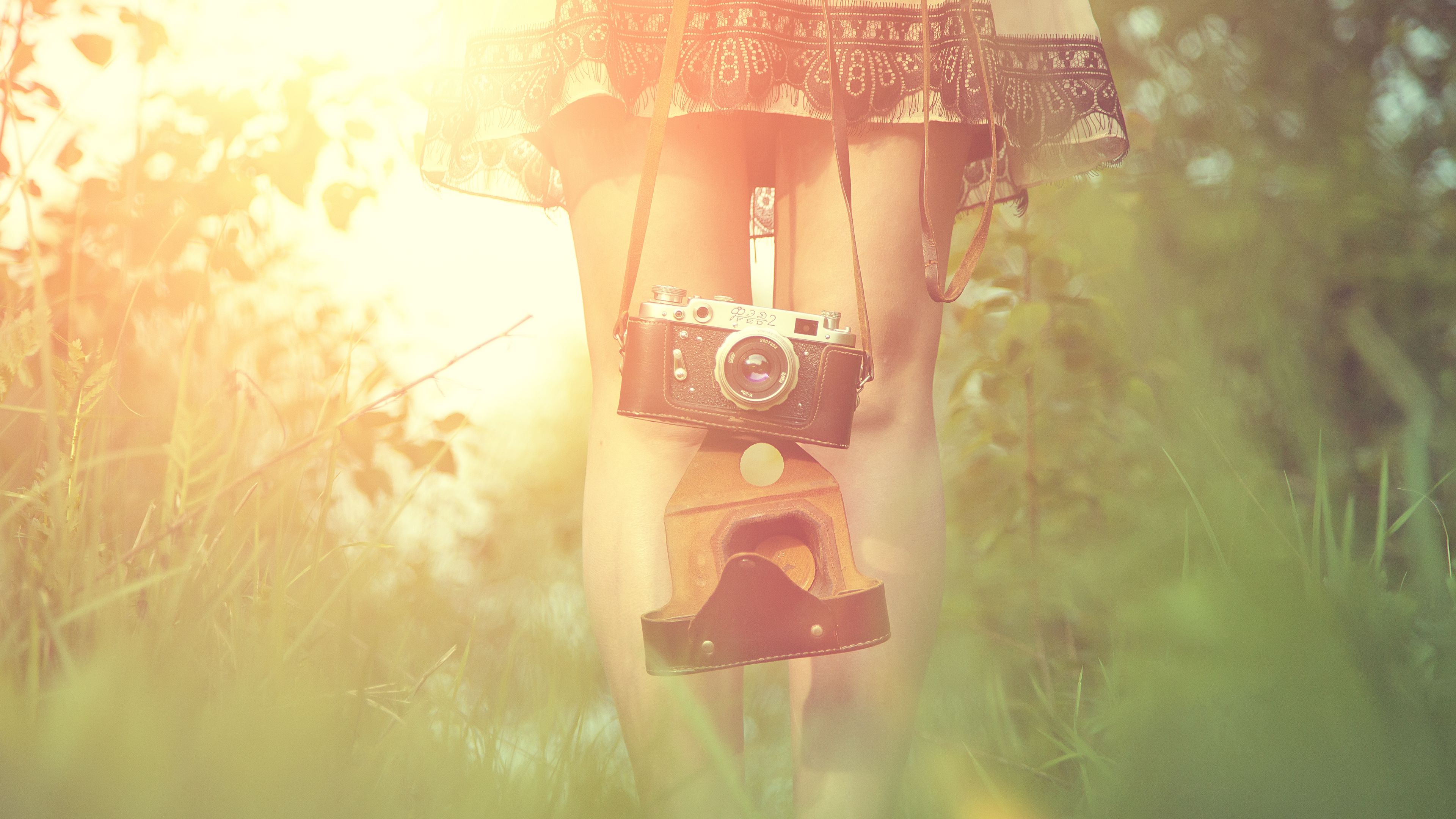girl, camera, sun, grass, legs, dress, flare, 4k, HD Wallpaper