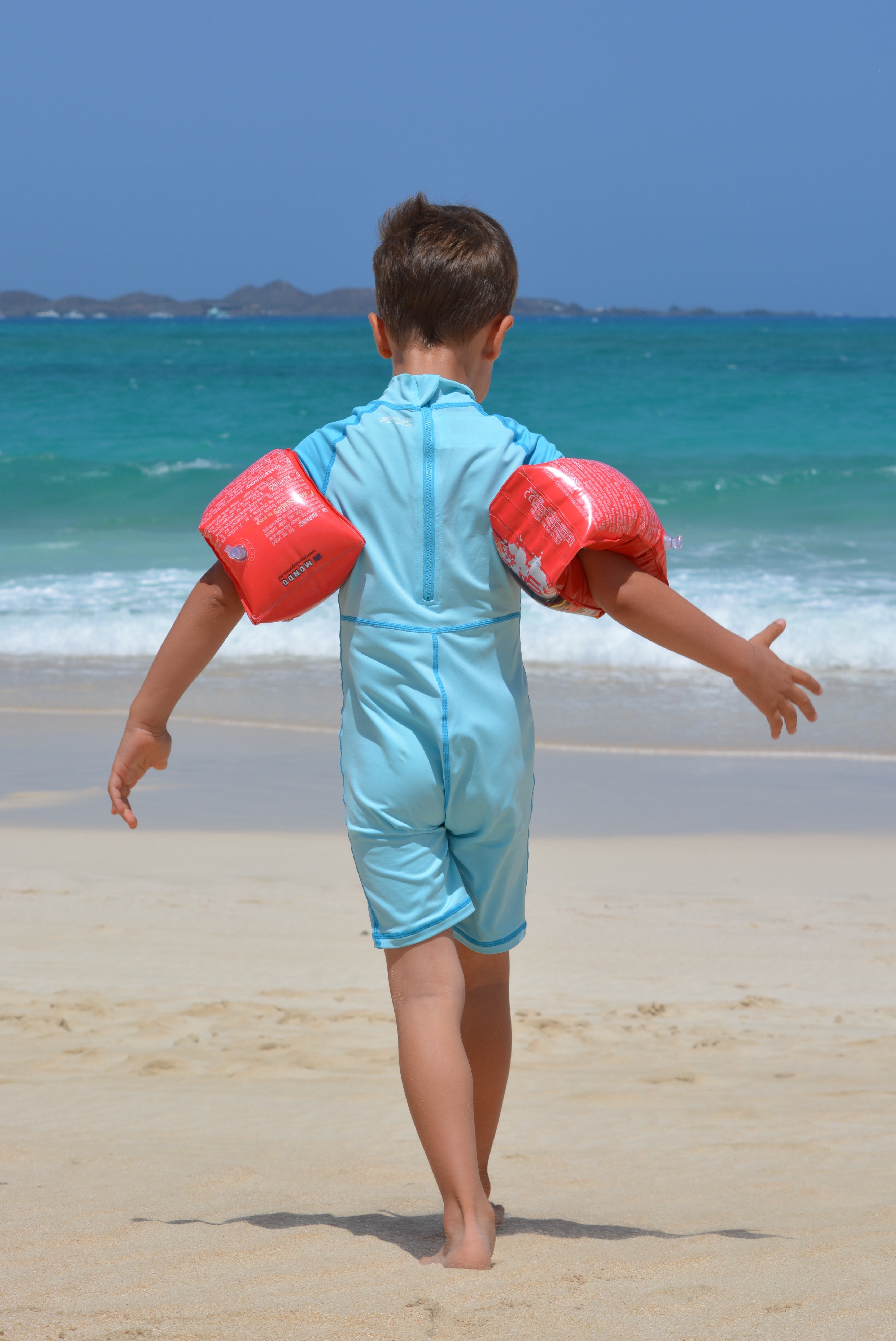 boy beach sea rubber rings uv suit child people 4k, Phone HD Wallpaper