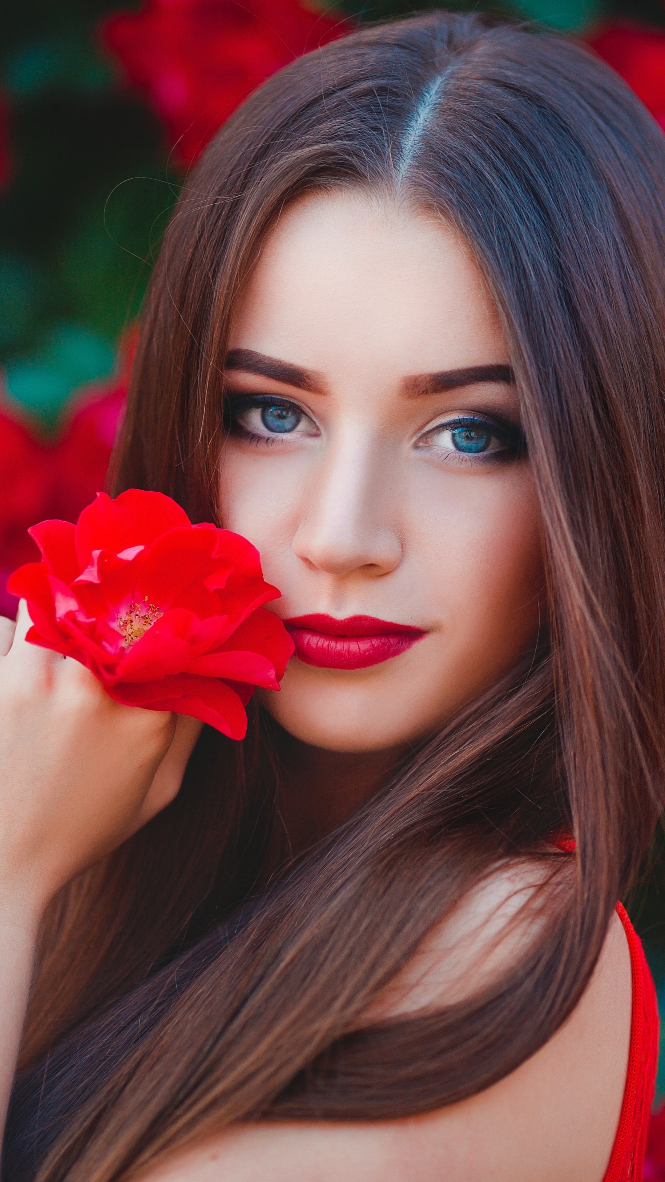 Women Model, Brunette, Blue Eyes, Long Hair, Red Flower, Lipstick, 2160x3840, Phone HD Wallpaper