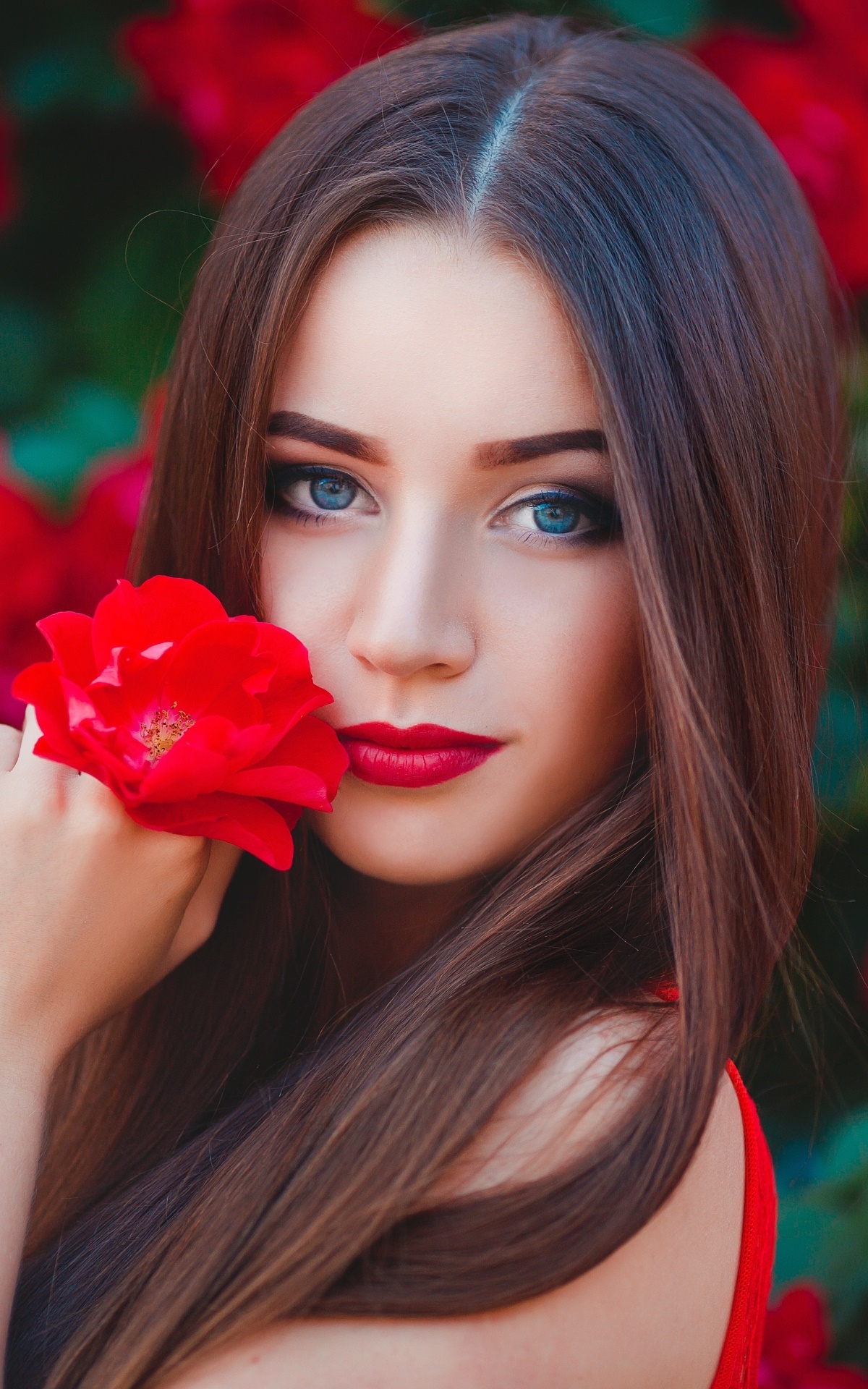 Women Model, Red Flower, Blue Eyes, Brunette, Lipstick, Long Hair, 1200x1920, Phone HD Wallpaper