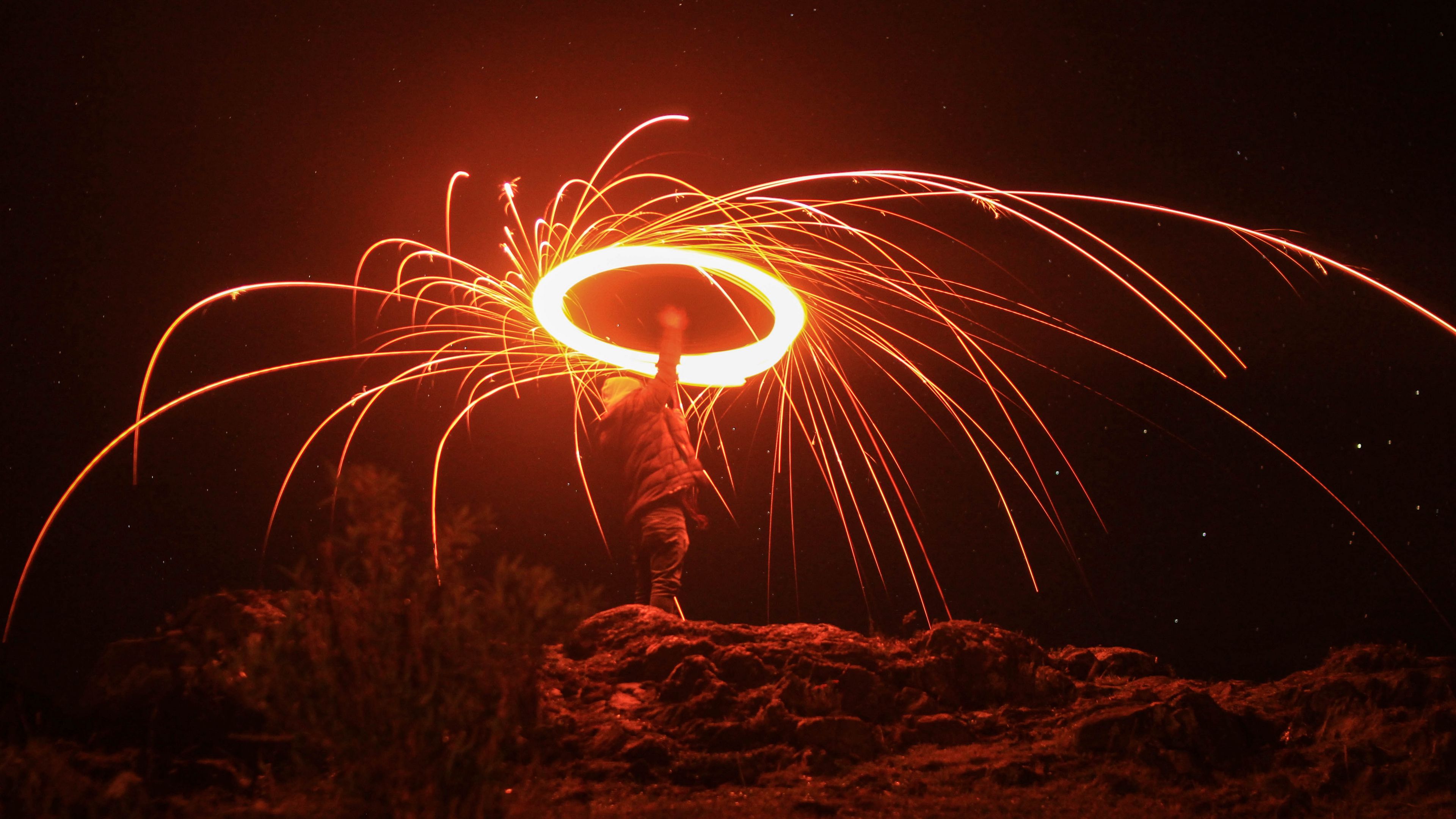 silhouette, light, sparks, dark, long exposure, 4k, HD Wallpaper