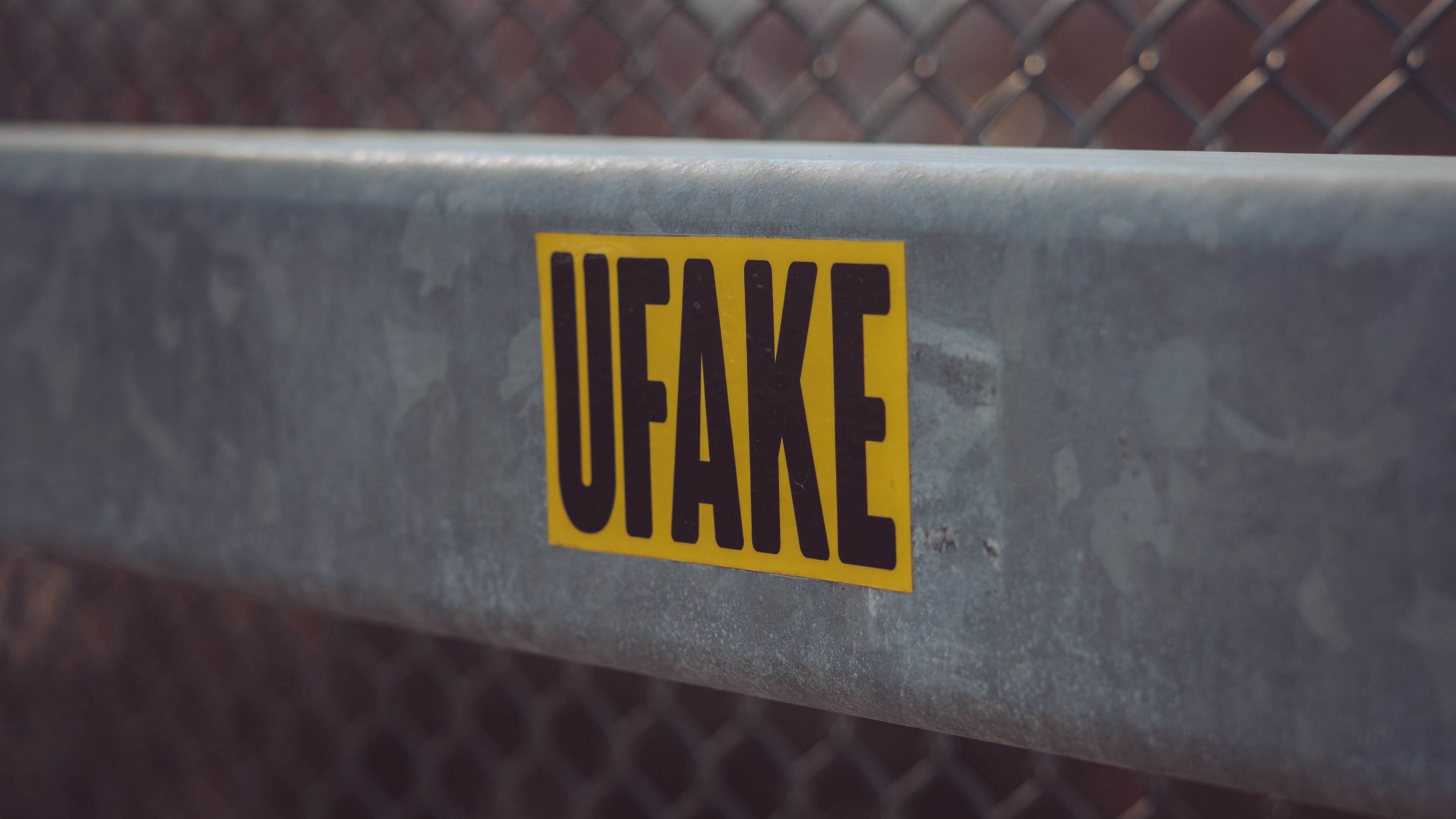 fake, sticker, inscription, fence, mesh, 4k, HD Wallpaper