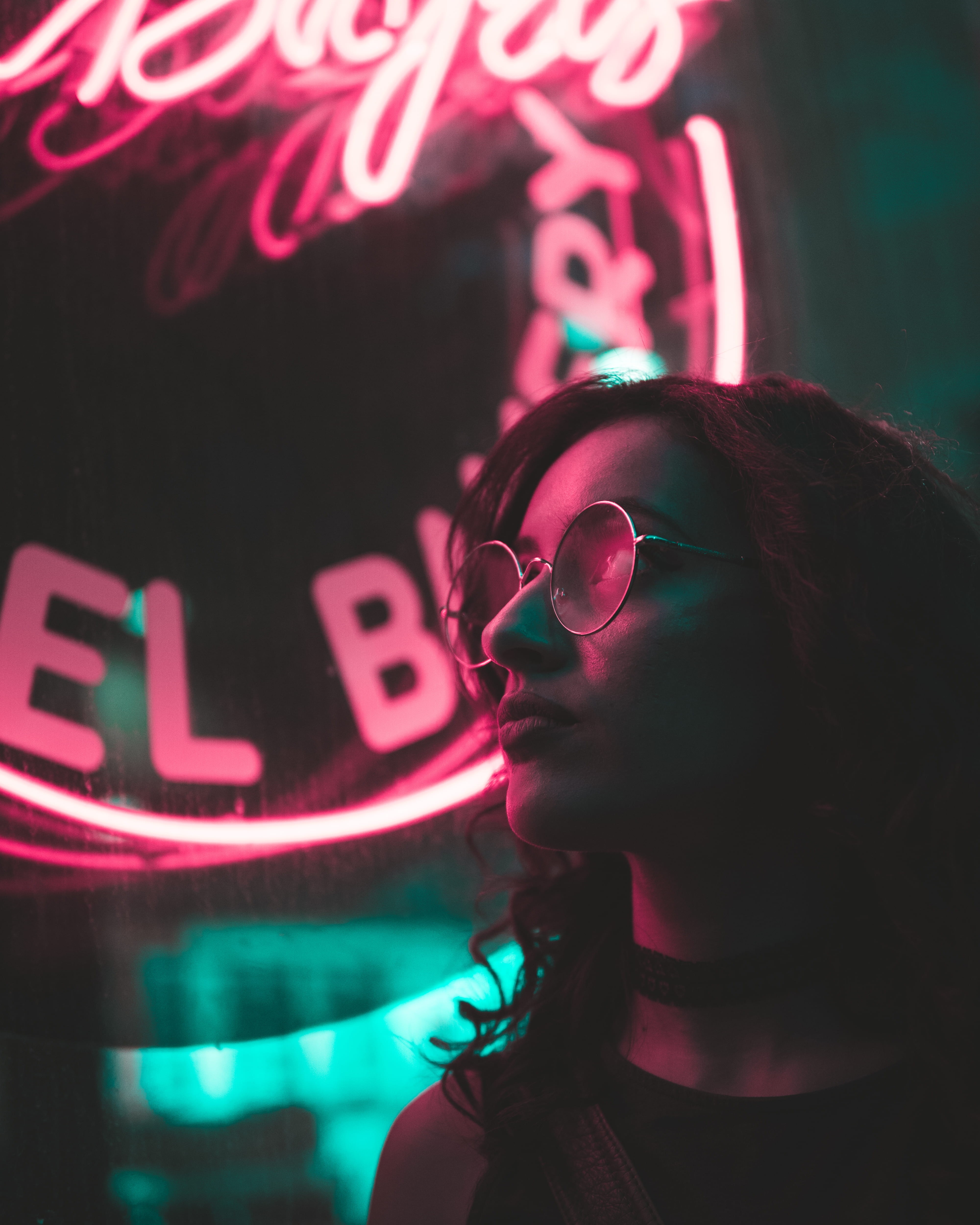 near, beautiful woman, girl, focus, red, nightlife, adult, sunglasses, lifestyles, pink, sidewalk, portrait, signage, one person, store, time, trendy, woman, Phone HD Wallpaper