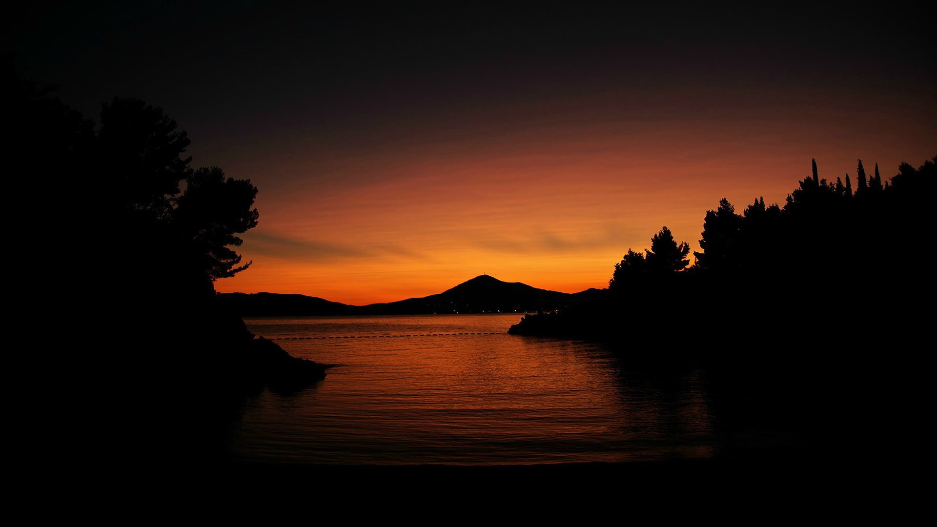 silhouette, sunlight, no people, evening, outdoors, celestial body, landscape, morning, scenic, tranquil, tranquil scene, beach, sea, sunrise, sun, orange color, HD Wallpaper