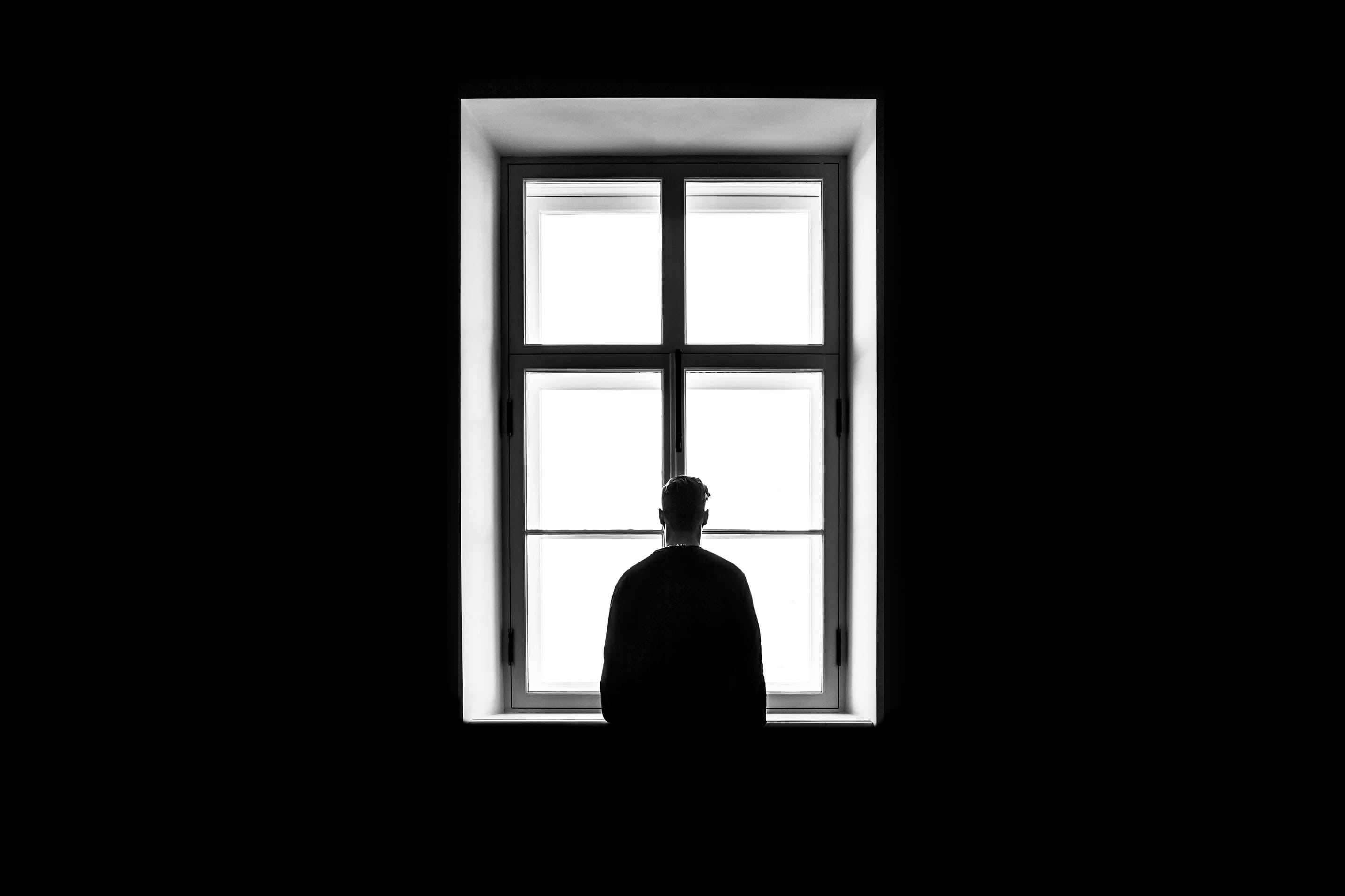 lonely, loneliness, rear view, light, looking out, 2K, window, standing, isolation, built structure, sad, architecture, person, men, solitude, one person, HD Wallpaper