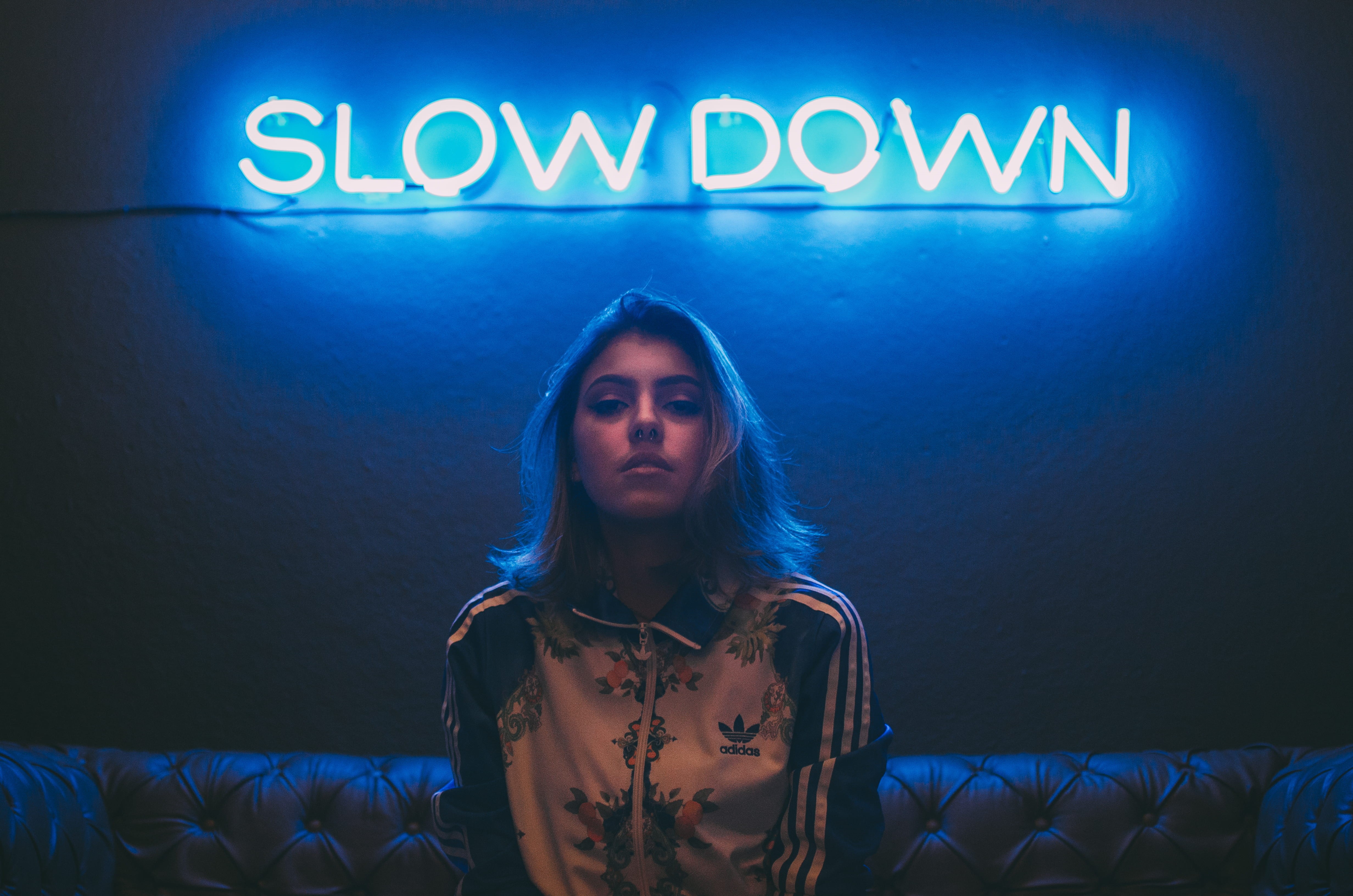 young adult, front view, portrait, women, woman, sofa, indoors, slow down, communication, jacket, neon, adult, headshot, western script, illuminated, 4K, HD Wallpaper