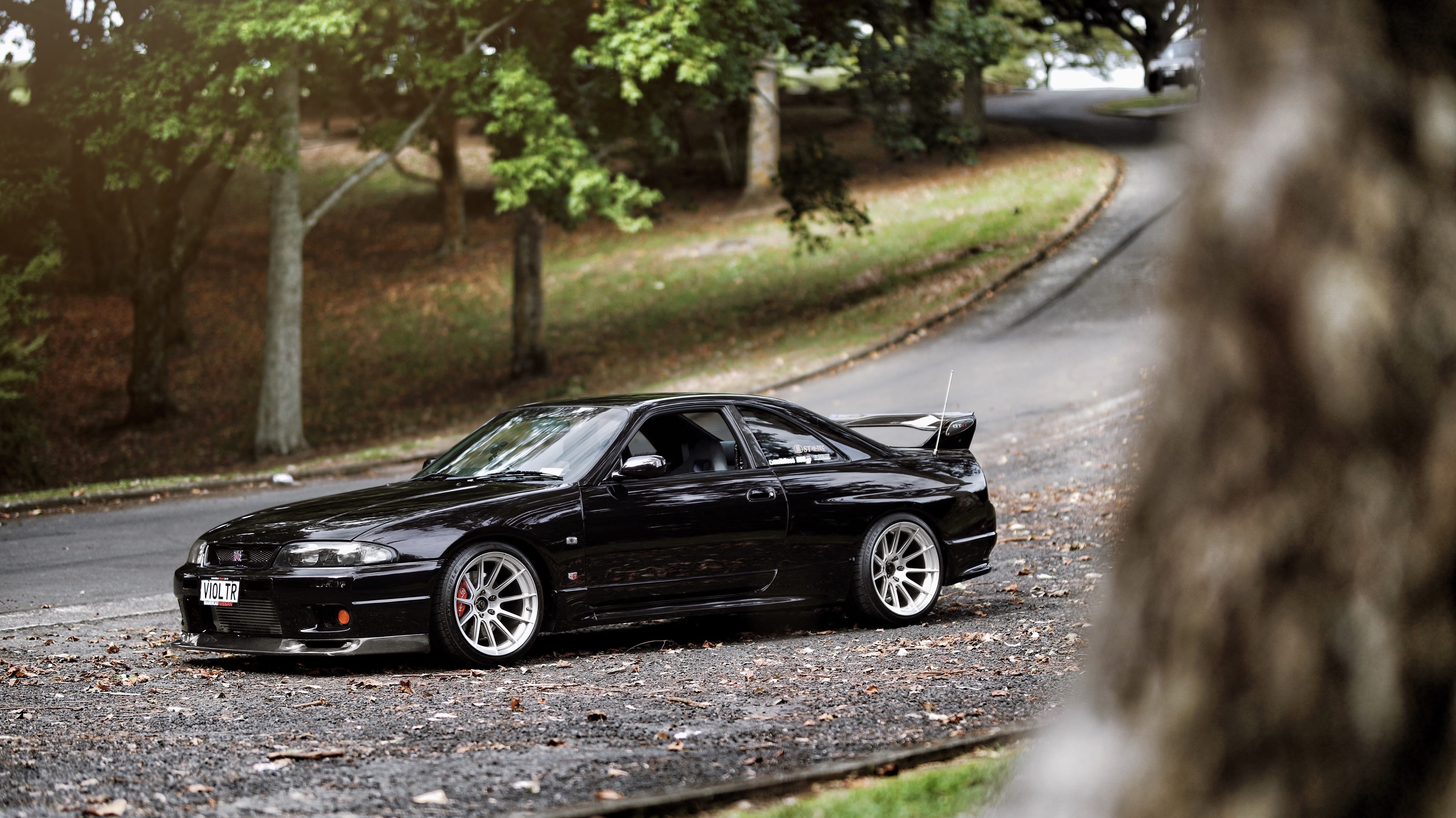 passing, outdoors, mode of transportation, black, selective focus, car wheel, machine, crash, nissan, 4K, transportation, road trip, plant, HD Wallpaper