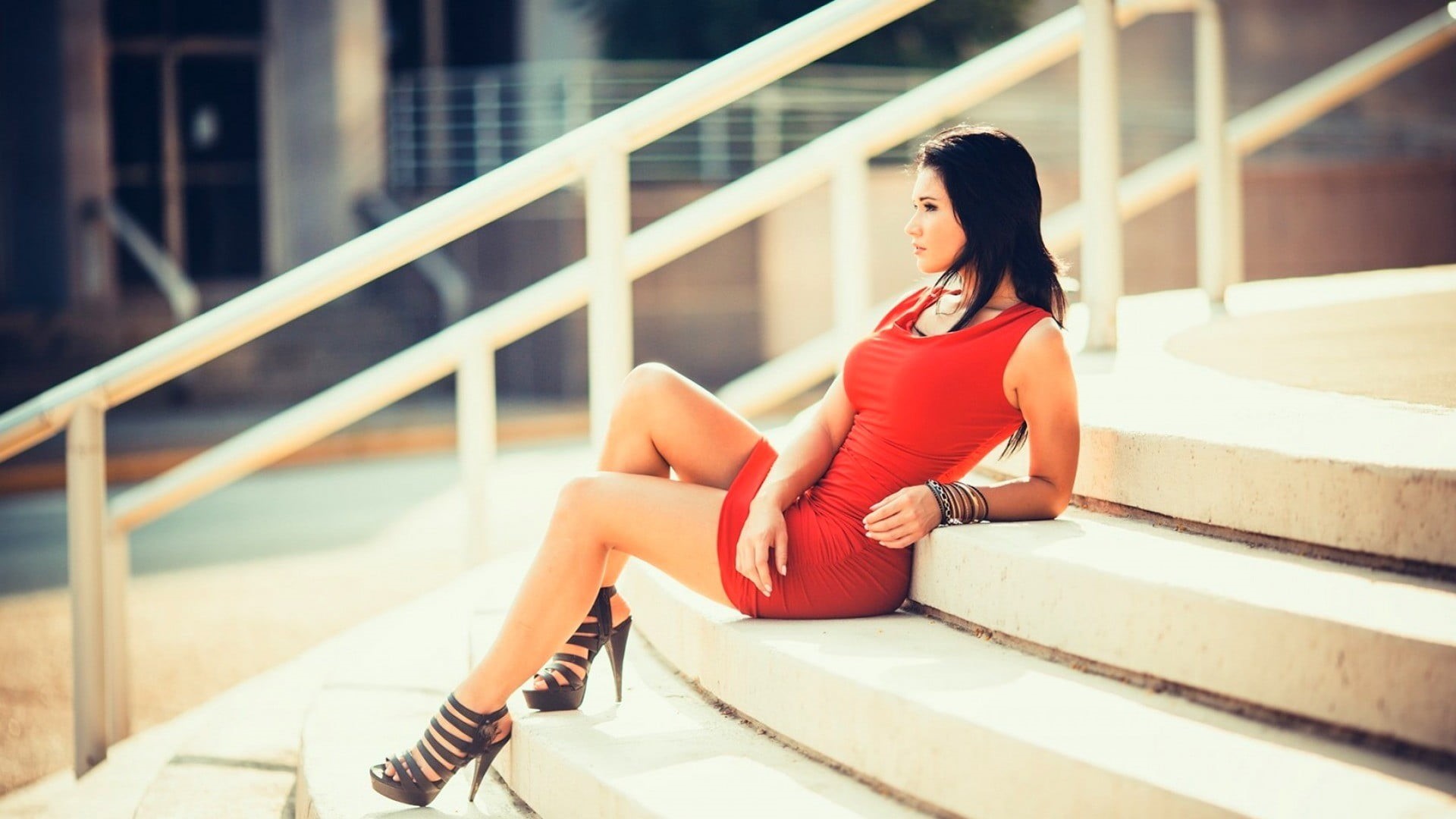 focus on foreground, young women, stairs, neck, outdoors, day, architecture, tight clothing, mini, brunette, sitting, scoop, dark hair, 1080P, staircase, HD Wallpaper