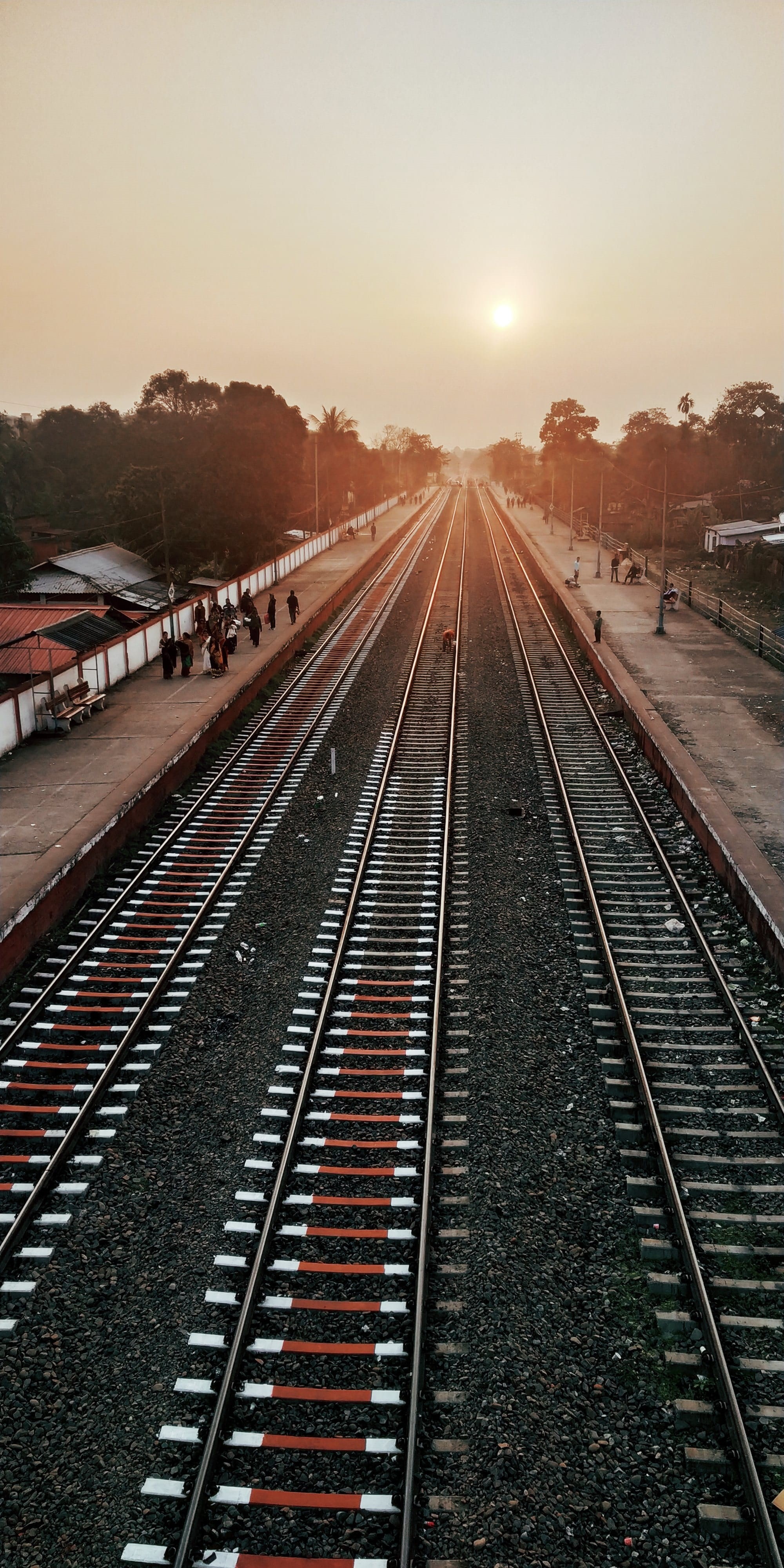 4K, indian, station, evening, sun, transportation, track, travel, public transportation, mode of transportation, no people, sunset, diminishing perspective, Phone HD Wallpaper