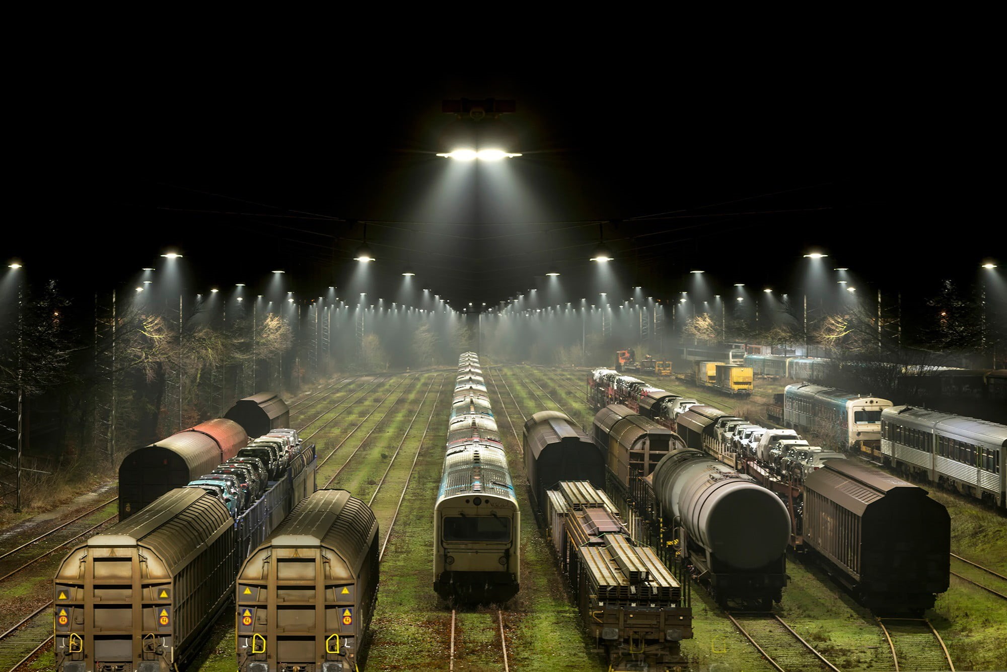 gray, trains, 1080P, in a row, transportation, rail transportation, sky, freight train, skyscraper, no people, train station, trees, glowing, plant, connection, HD Wallpaper