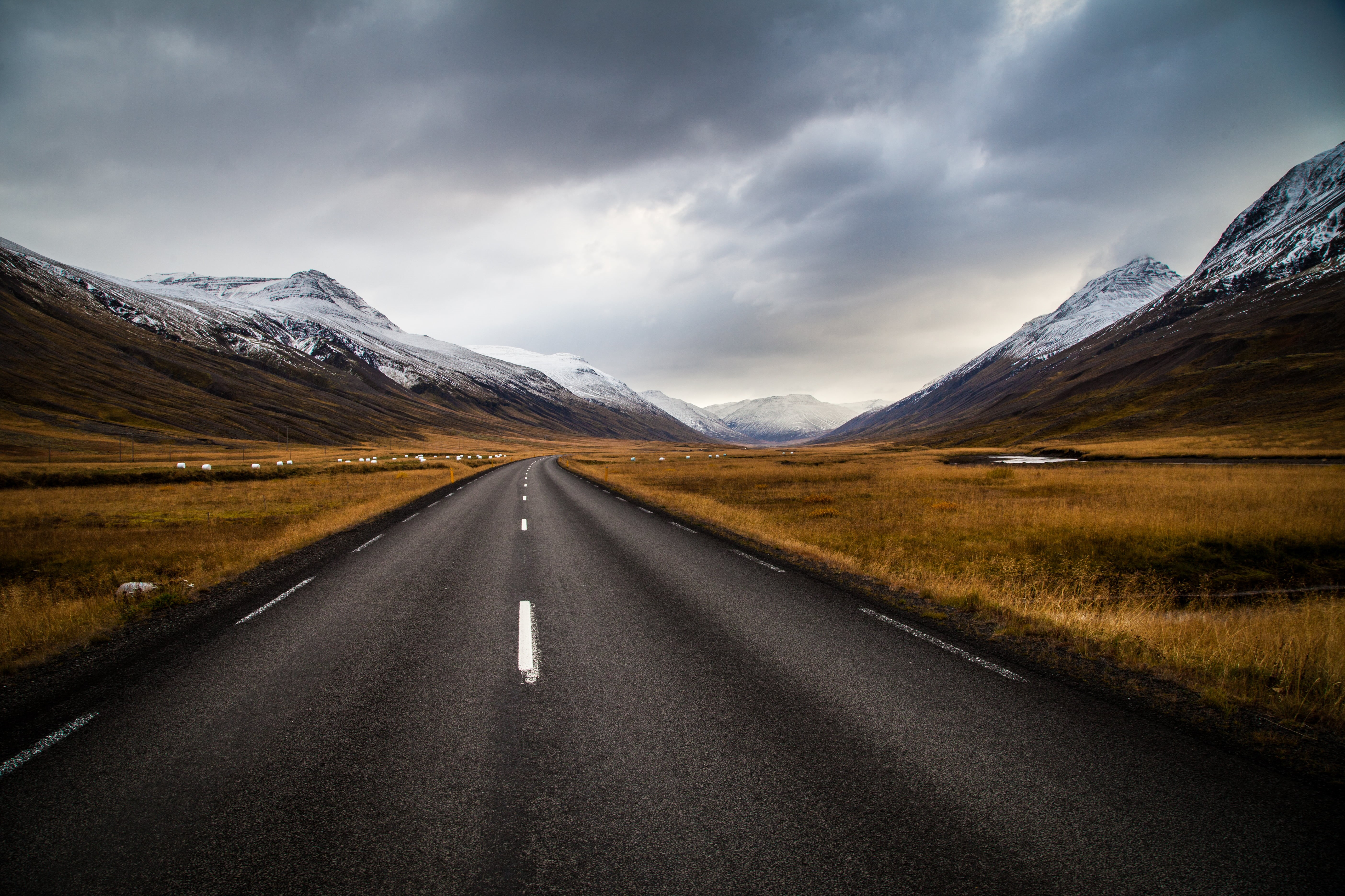 iceland, nature, grass, travel, no People, scenics, black, highway, field, mountain, landscape, snow mountains, mountains, snow, outdoors, concrete road, HD Wallpaper