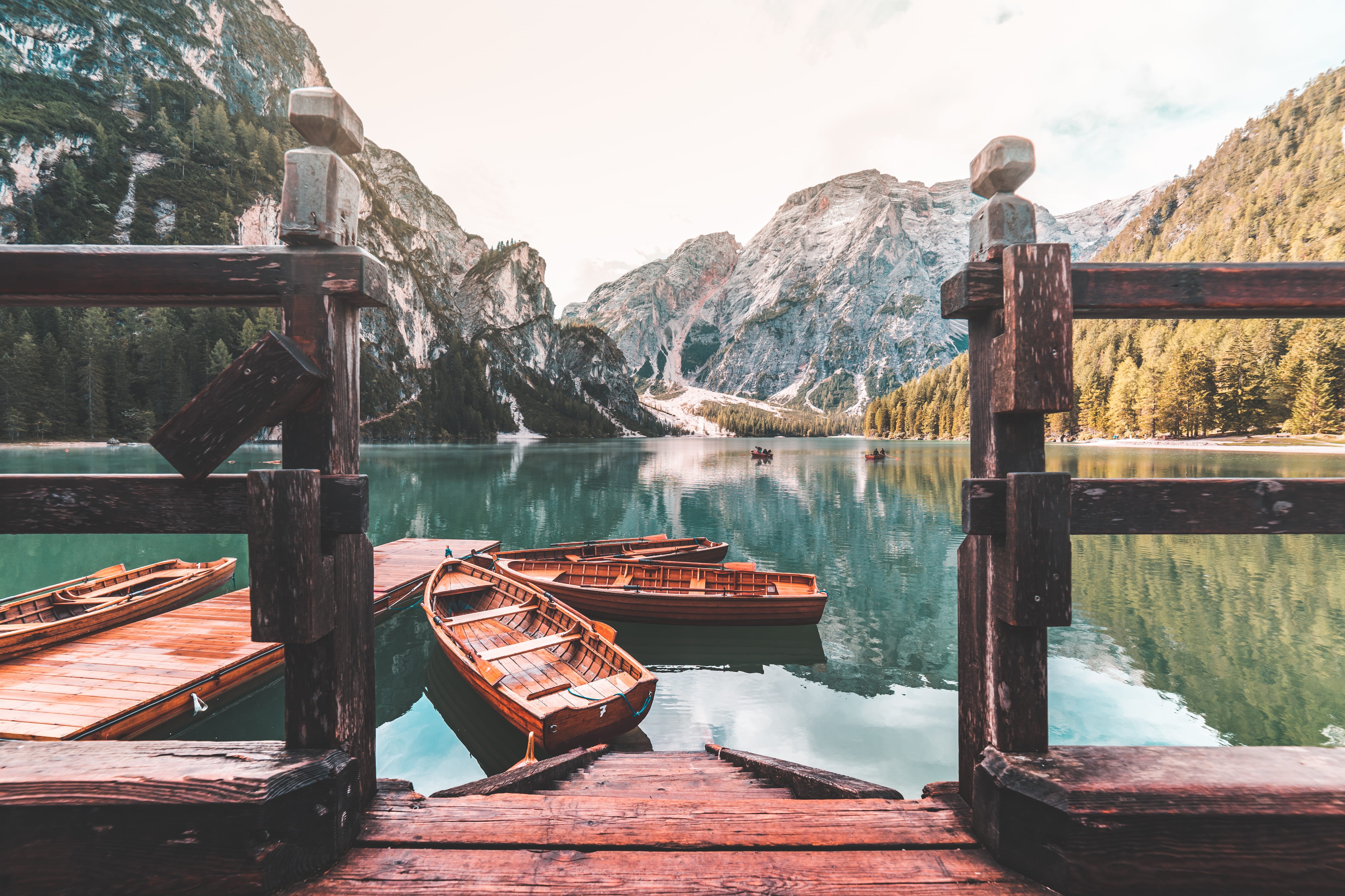 rocks, travel, italy, rowing boats, sunlight, lago di braies, traveling, mountain range, nautical vessel, famous, rowboat, nature, scenery, lago, braies, HD Wallpaper
