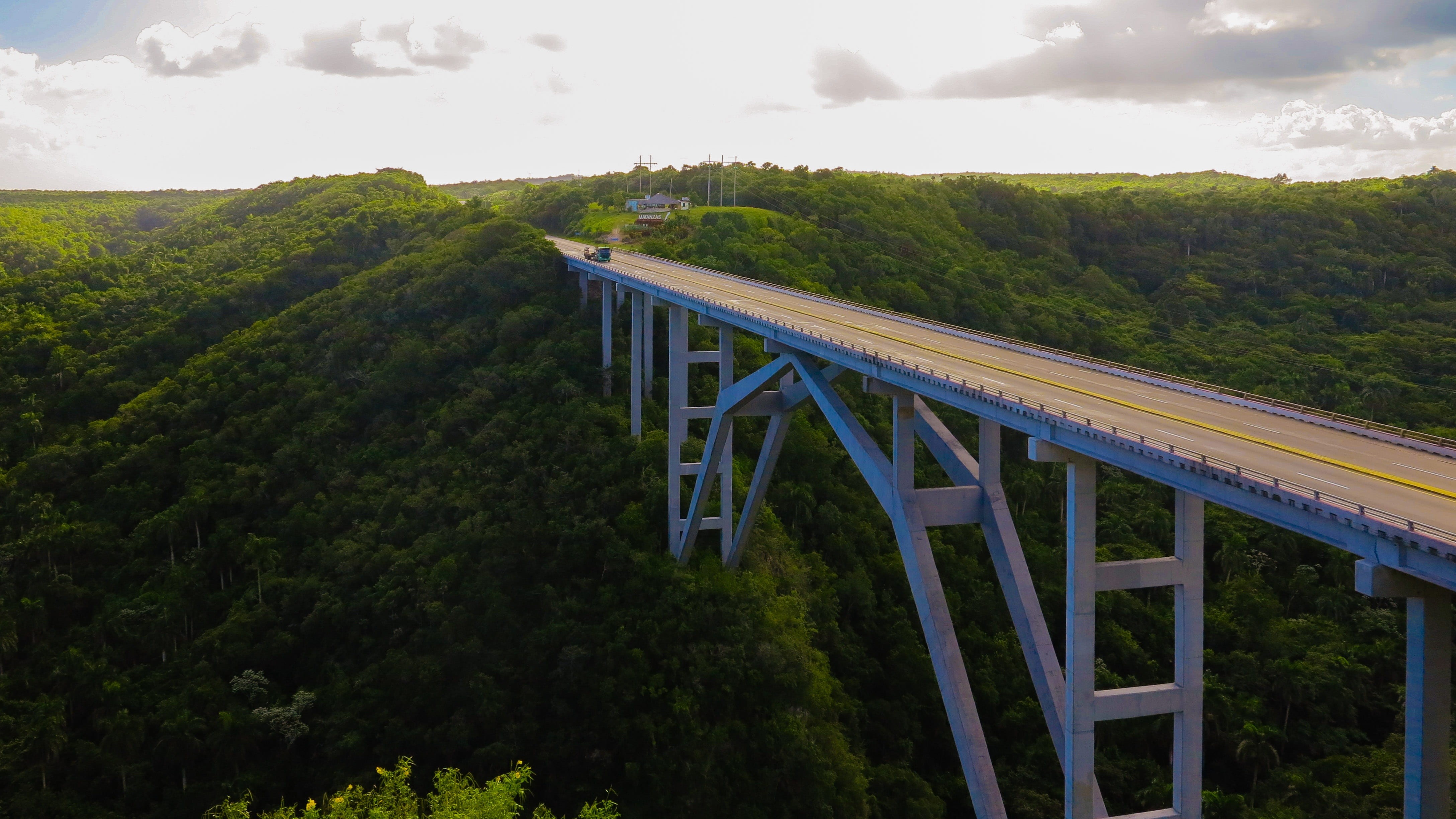 day, 4K, land, built structure, cloud - sky, mountain, towards, view, nature, plant, no people, amazing view, varadero, bridge, outdoors, connection, landscape, HD Wallpaper
