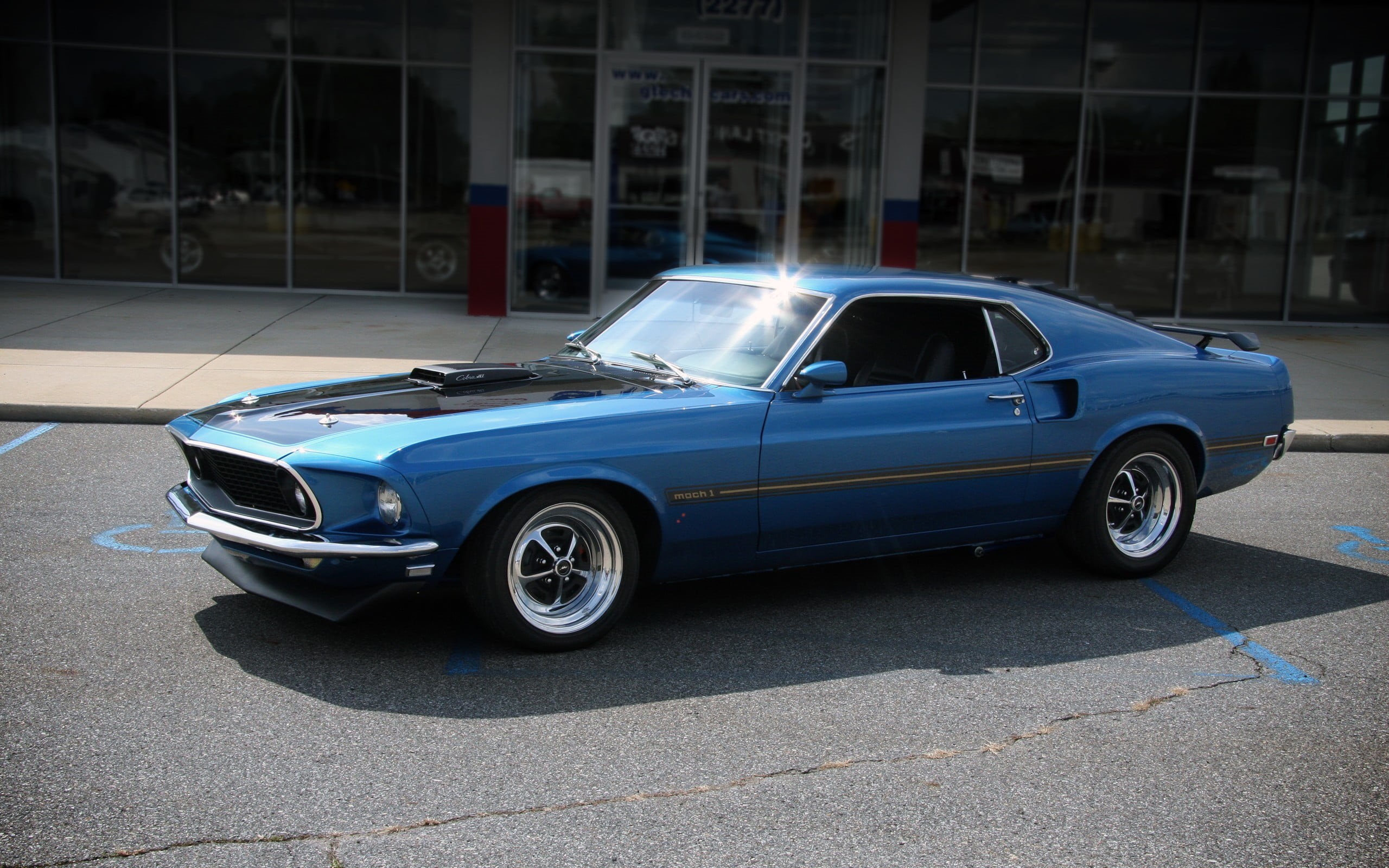 transportation, coupe, street, 2K, vintage car, Ford, parking lot, city, building exterior, outdoors, luxury, no people, day, stationary, built structure, HD Wallpaper