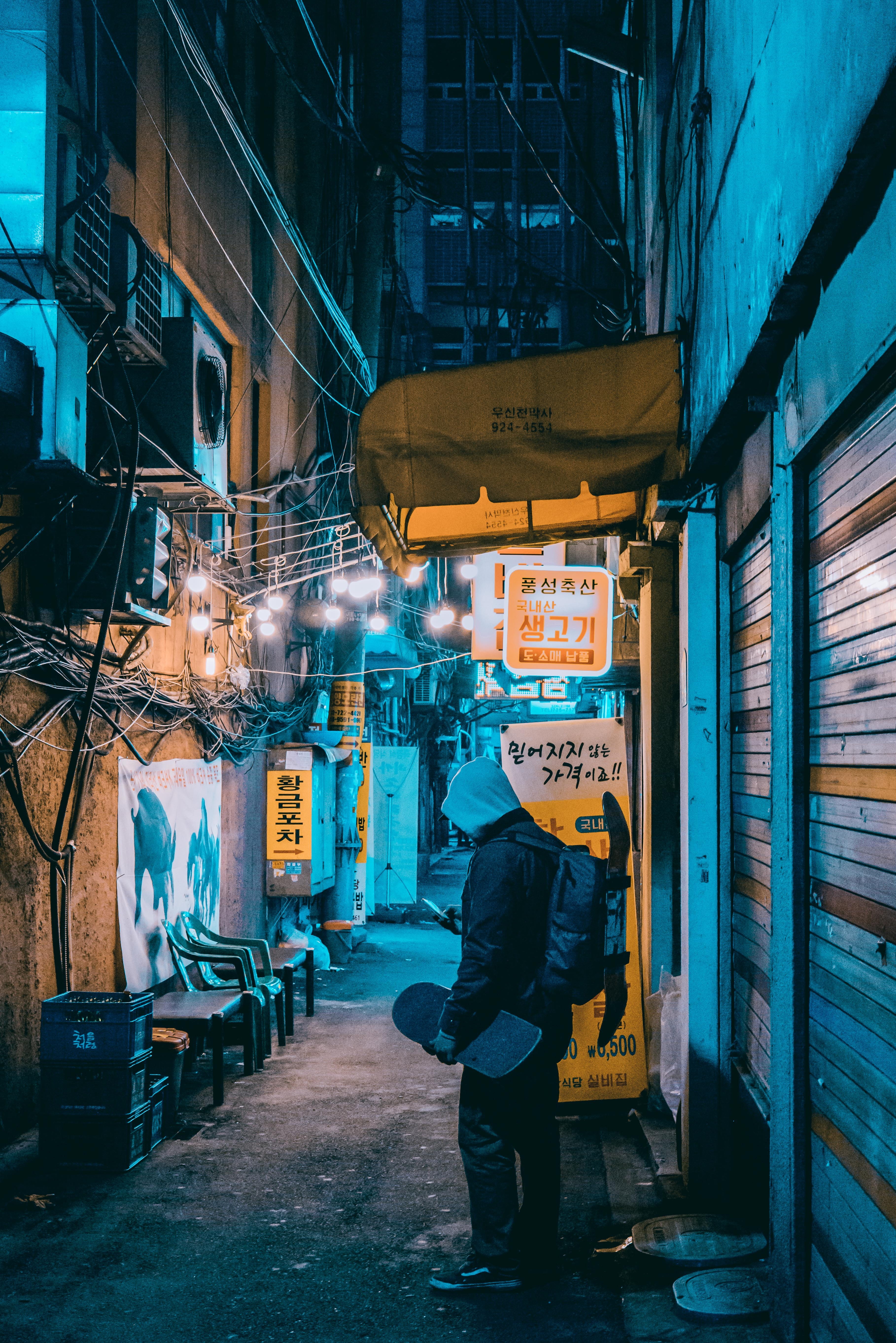 seoul, blue, hood, night photography, lifestyles, man, city, leisure activity, built structure, outdoors, glow, real people, architecture, skater, building exterior, Phone HD Wallpaper