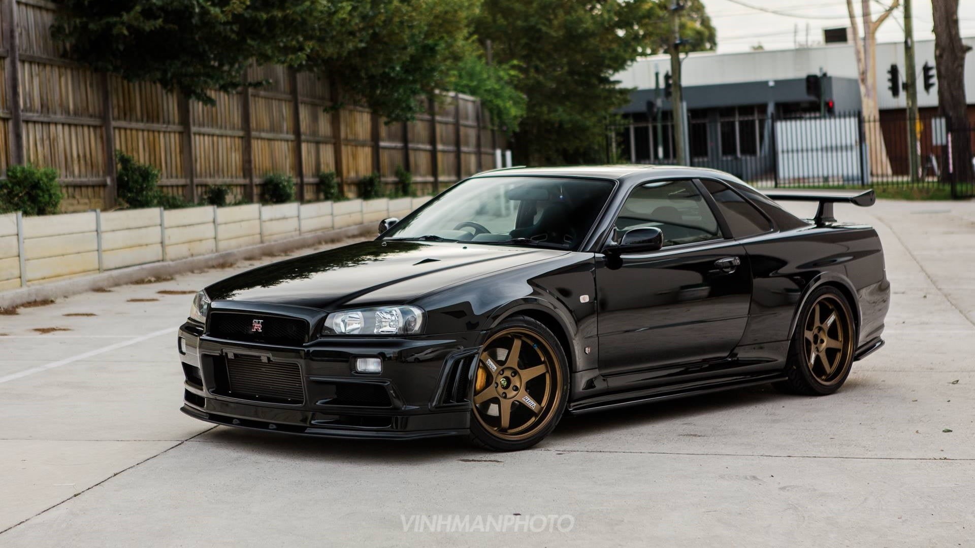 black cars, r, transportation, road, city, architecture, Japanese cars, no people, outdoors, focus on foreground, land vehicle, wheel, Nissan Skyline GT-R R34 V-Spec II Nür, HD Wallpaper