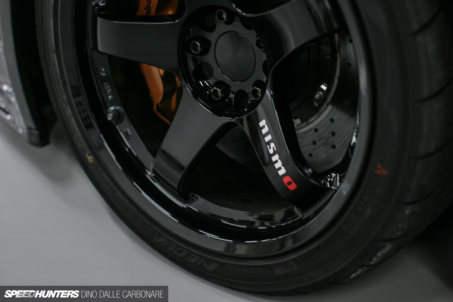 Nissan Skyline GT-R R34 Nismo, motor vehicle, transportation, vehicle part, single object, 1080P, no people, tire, Skyline R34, Speedhunters, modern, equipment, HD Wallpaper
