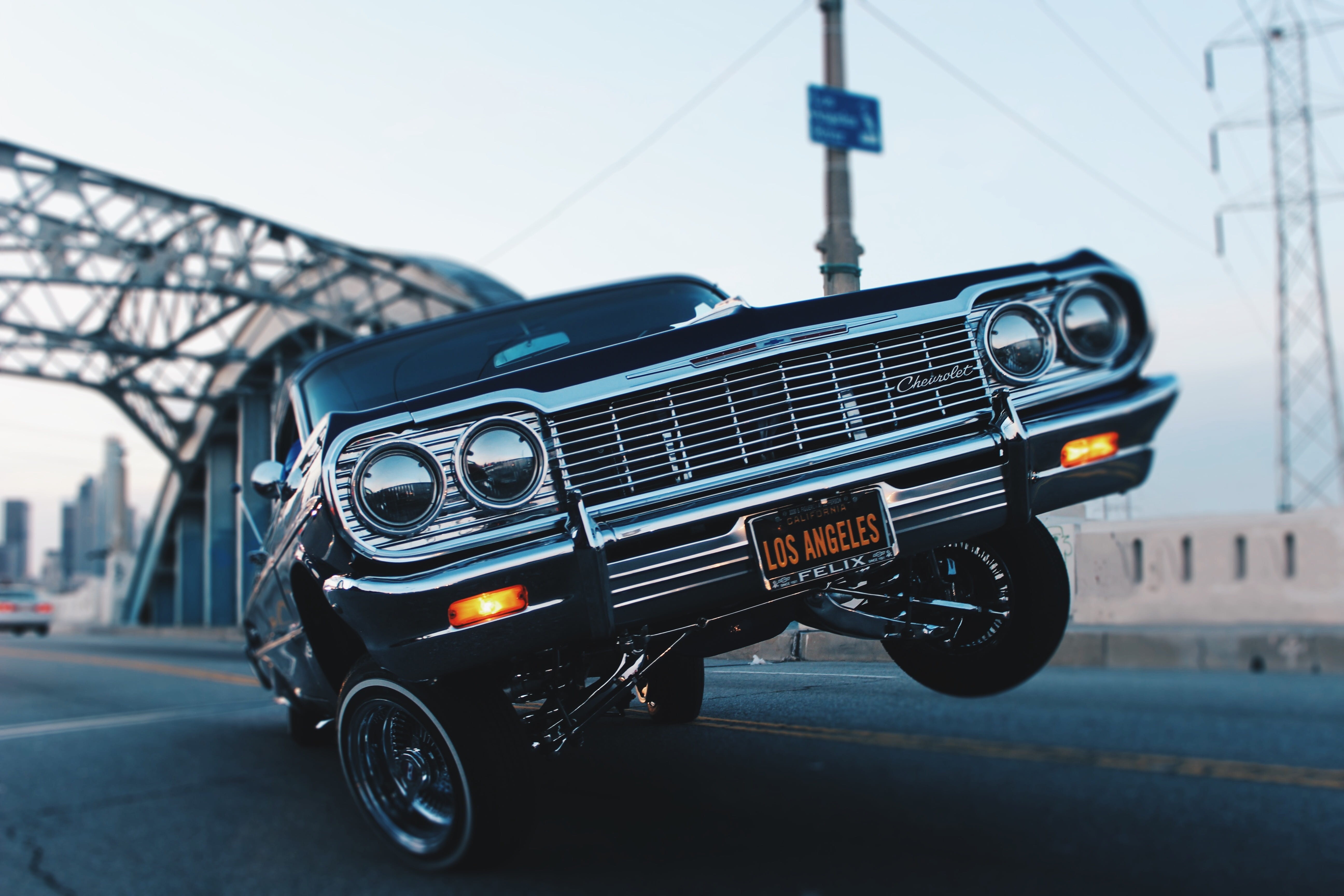 focus on foreground, technology, land vehicle, car, oldschool, low rider, 5K, no people, city, black, architecture, stationary, travel, vintage, street, HD Wallpaper