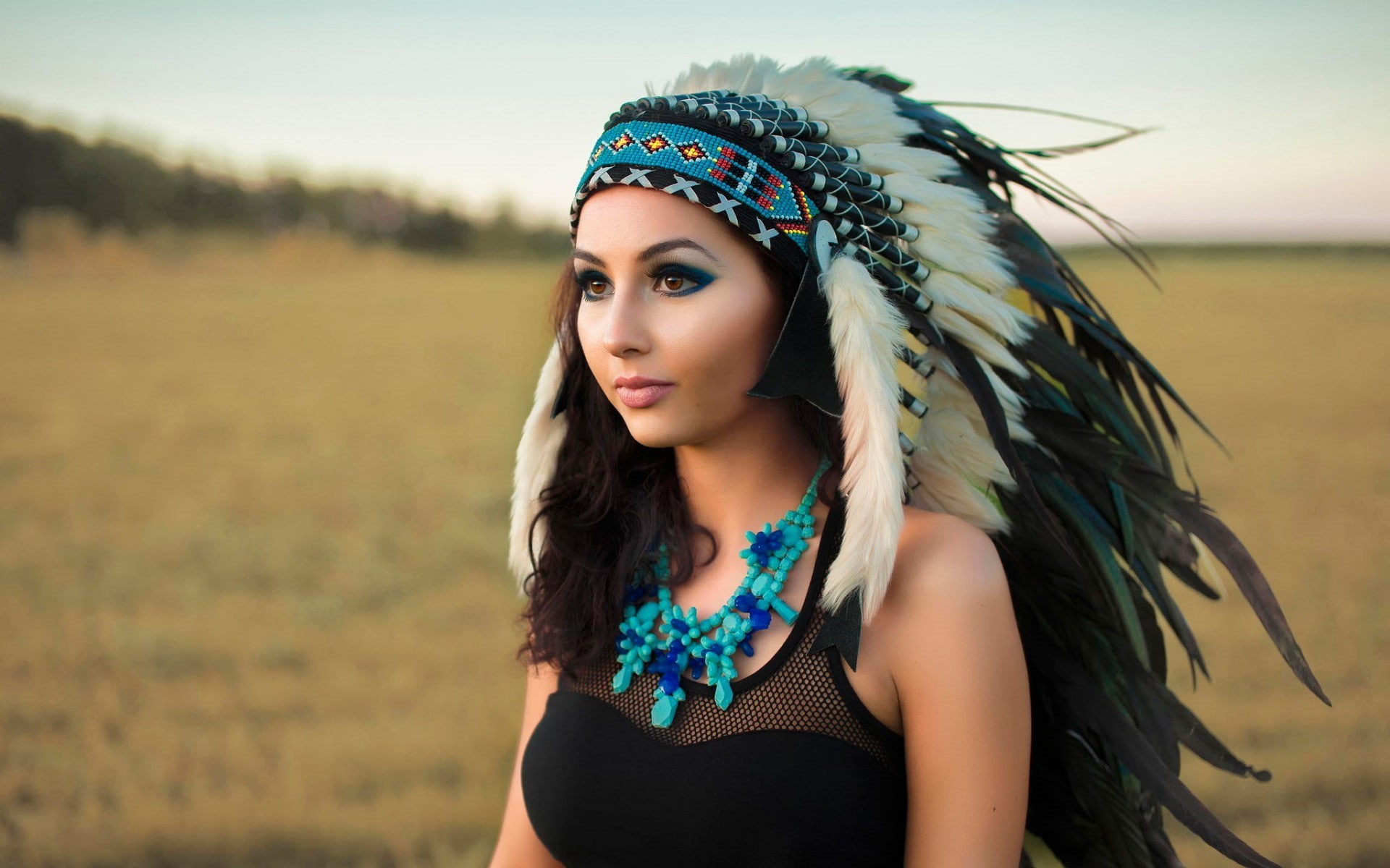 american, face, looking away, field, black clothing, land, women, feathers, looking at camera, clothing, 1080P, young adult, young women, white, brown eyes, HD Wallpaper
