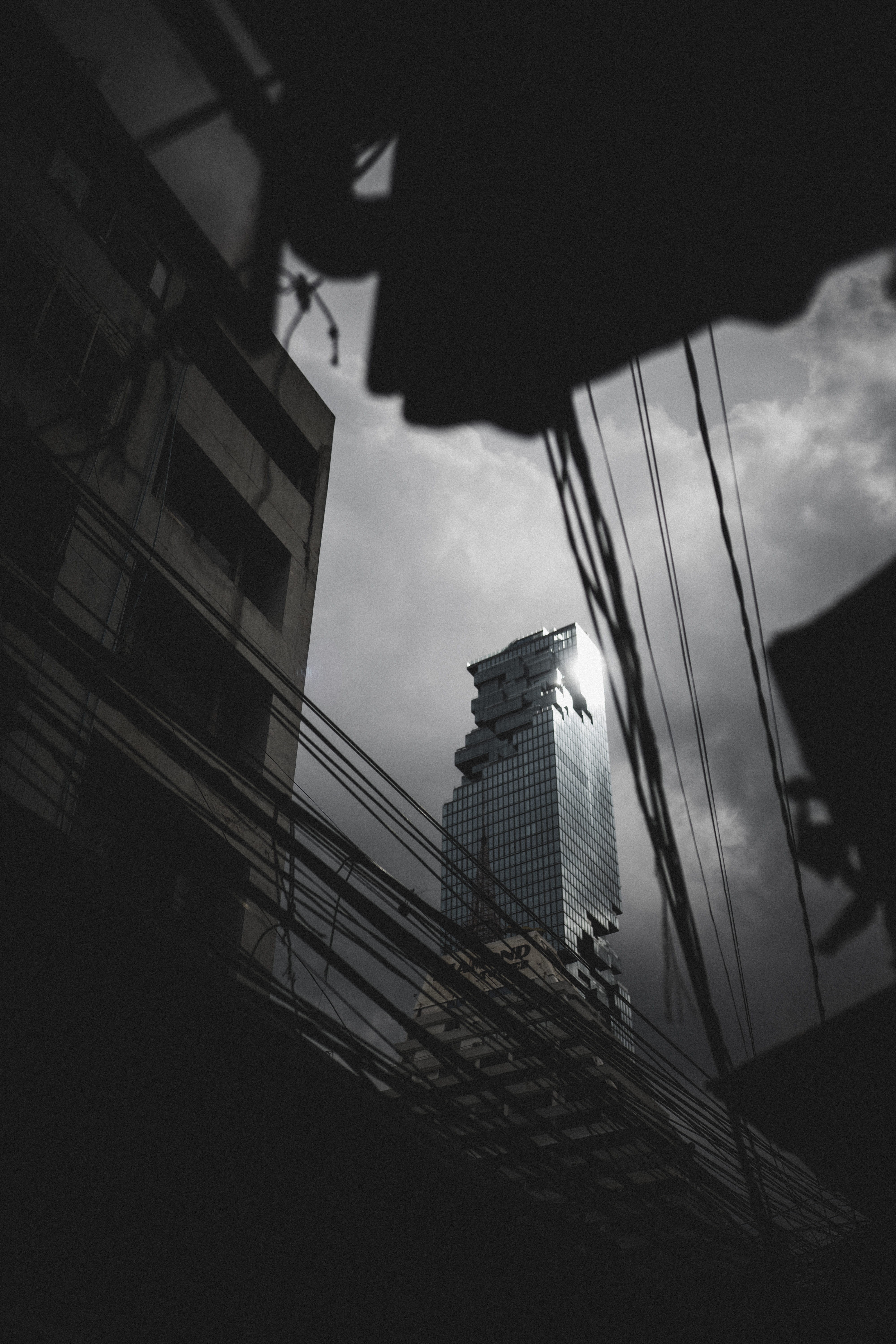 destroyed, dystopic, nature, city life, grayscale, cloud - sky, 5K, sunlight, black and white, construction industry, city, building exterior, dark, mahanakhon, Phone HD Wallpaper
