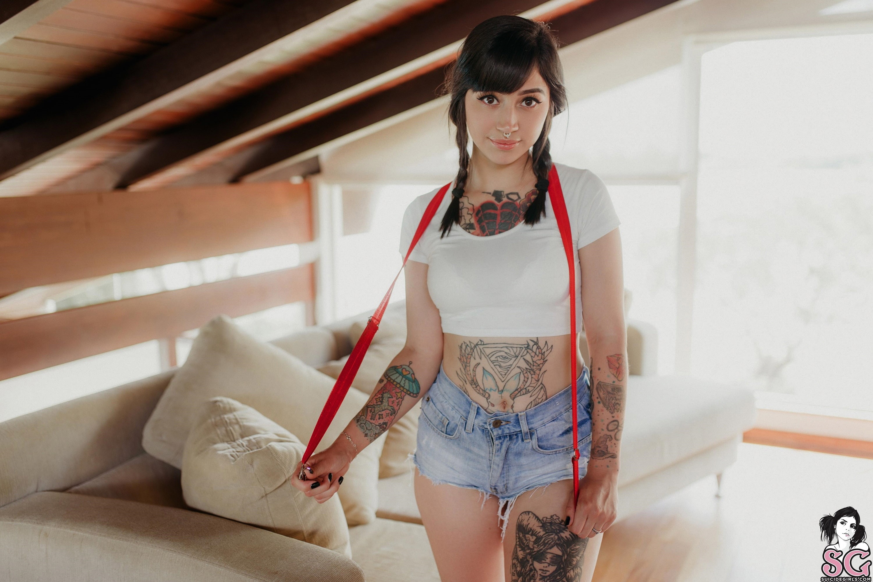 eyeliner, jean shorts, depth of field, cushions, portrait, smiling, tattoo, standing, suspenders, women, Dawud Suicide, indoors, 2K, black nails, braids, HD Wallpaper
