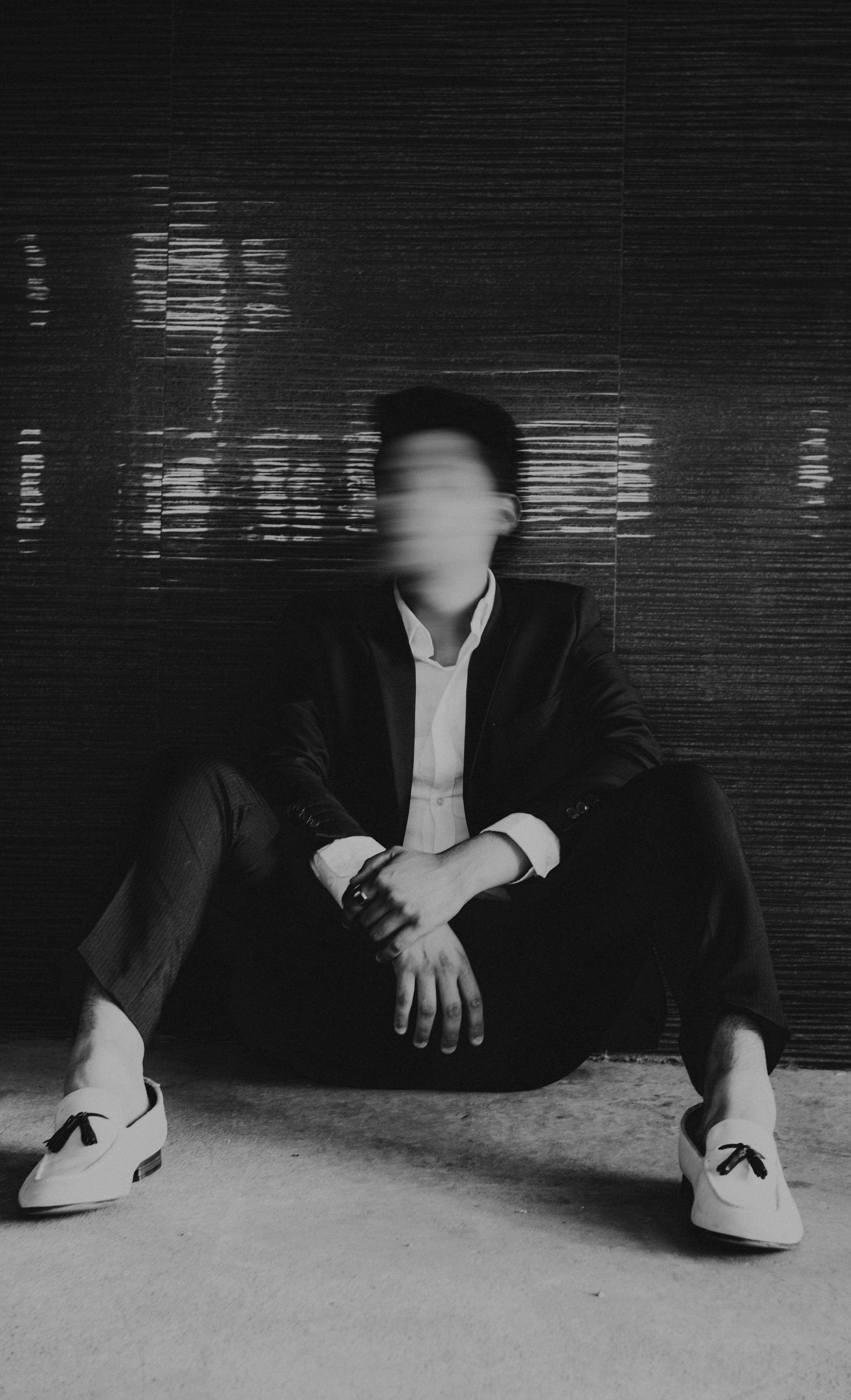 real people, black and white, hand, style, abstract, suit, blurred motion, motion, artistic, leisure activity, adult, man, sitting, no face, contemplation, Phone HD Wallpaper