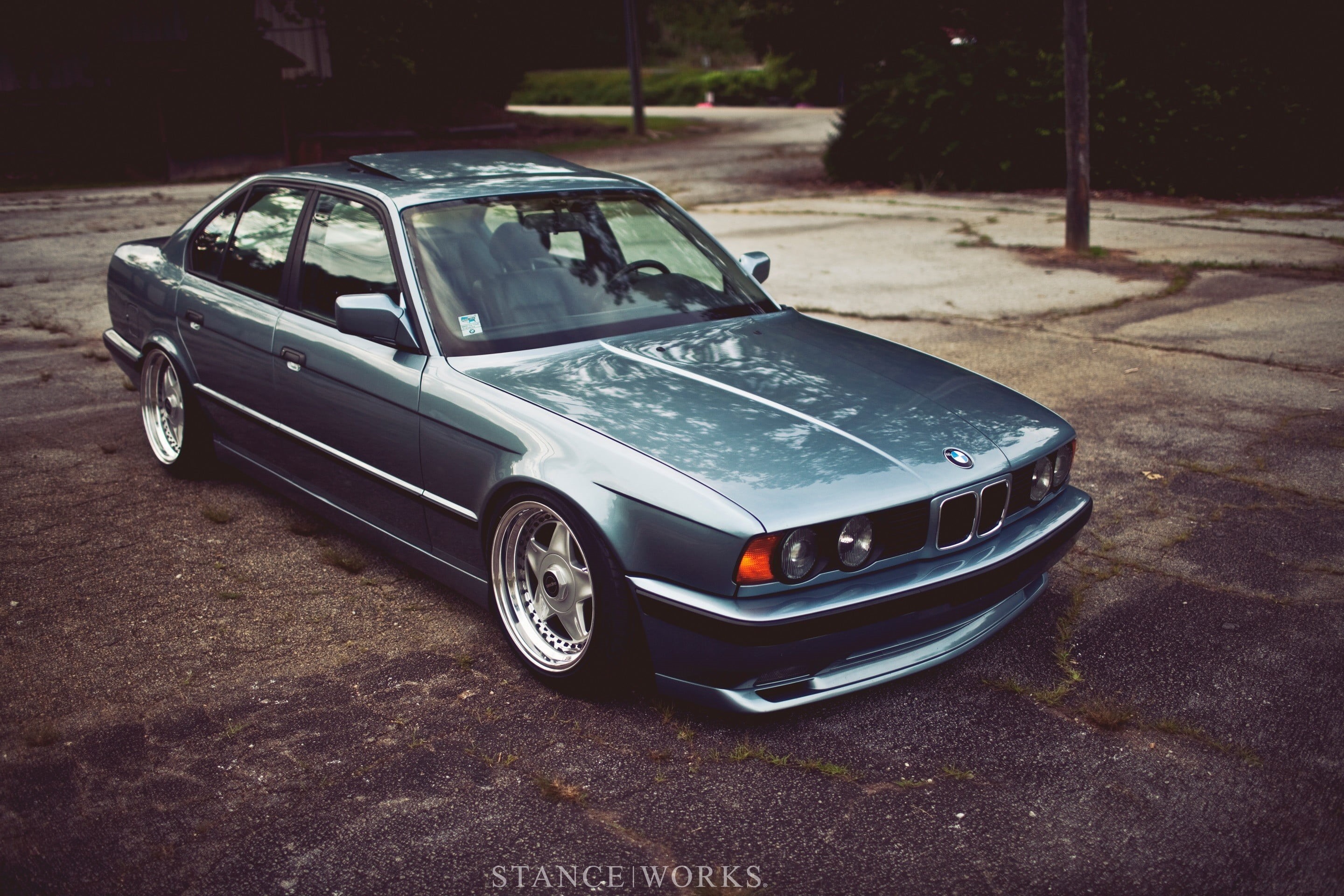 blue, car, 2K, motor vehicle, land vehicle, BMW E34, transportation, no people, focus on foreground, retro styled, typography, street, mode of transportation, HD Wallpaper