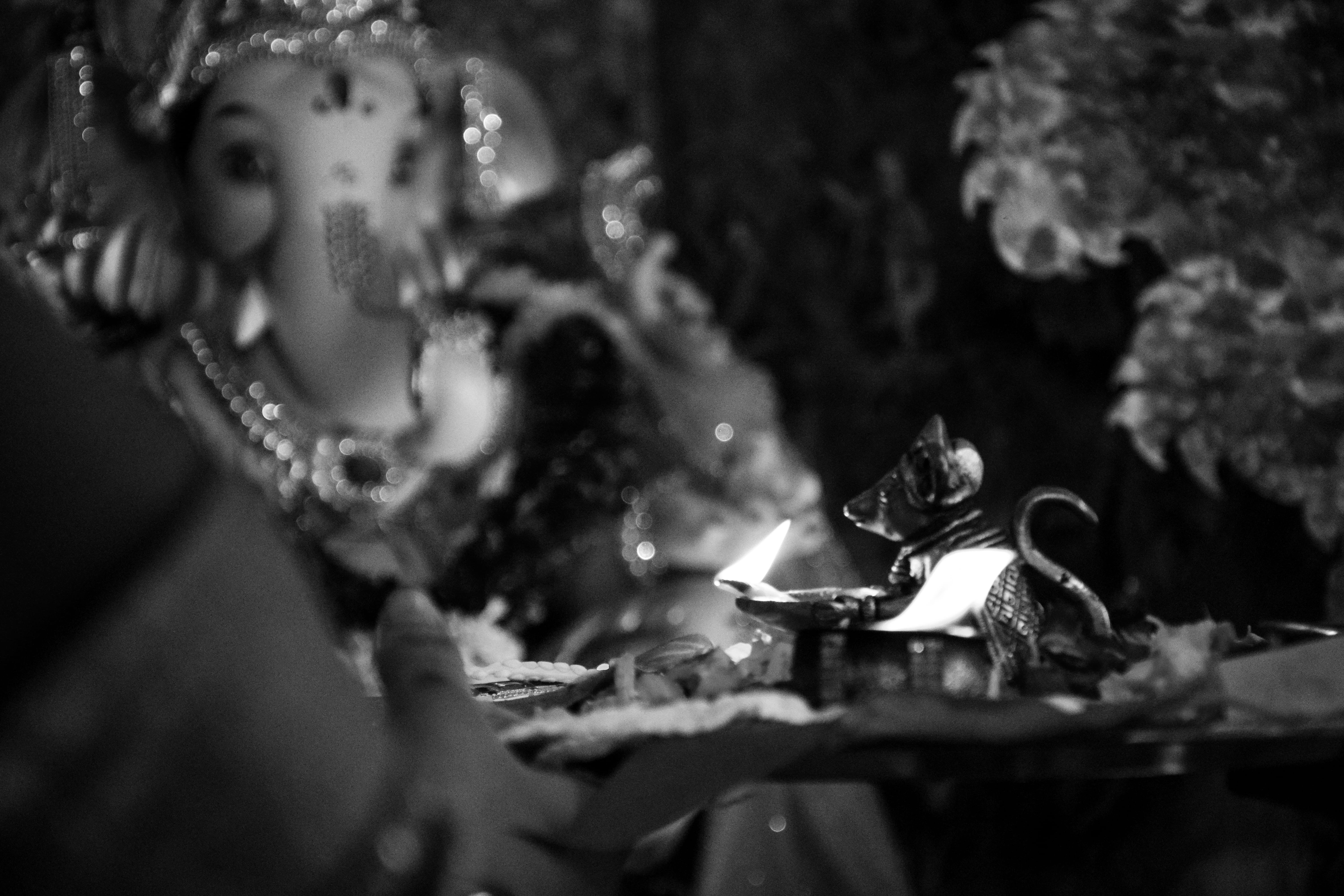 heat - temperature, idol, focus on foreground, headshot, women, hinduism, burning, fire - natural phenomenon, mouse, holding, mumbai, hindu, ganesh, family, HD Wallpaper