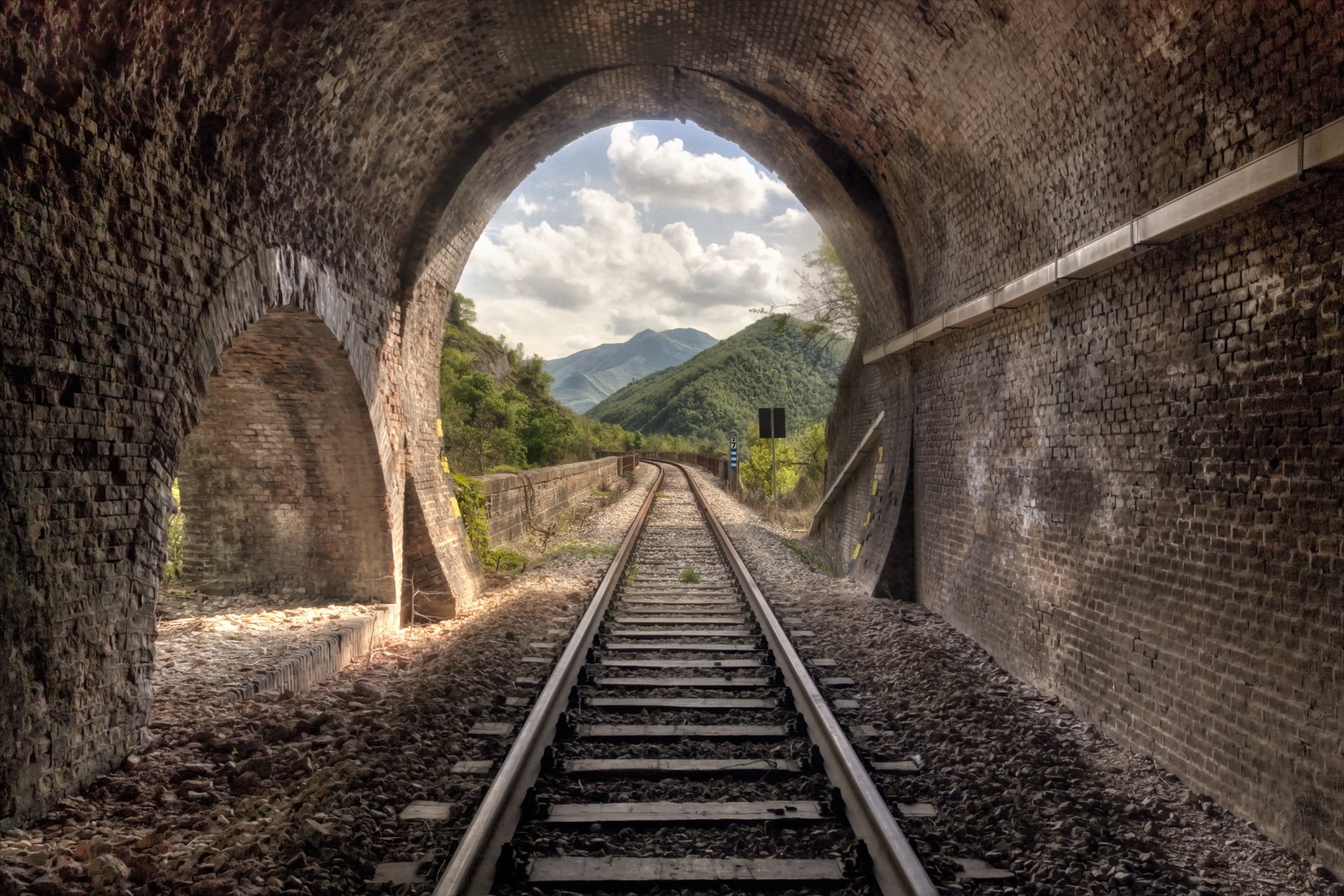 day, tree, railway, hills, the way forward, built structure, plant, no people, transportation, direction, sky, arch, diminishing perspective, cloud - sky, HD Wallpaper