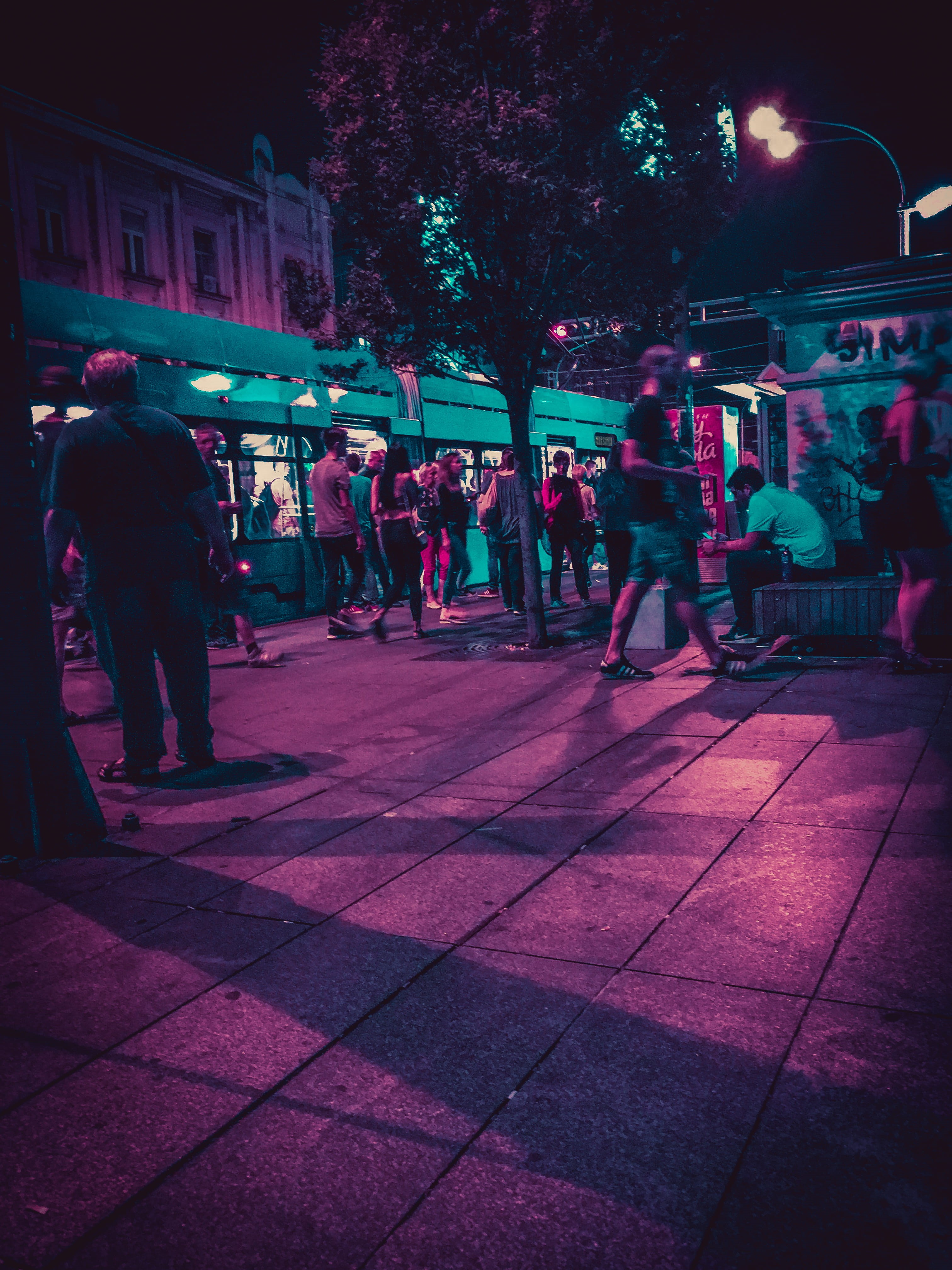 city, cyberpunk, pink, blue, cybervibes, night, building exterior, footpath, neon, urban, tram, neo noir, people, neon lights, purple, sidewalk, crowd, Phone HD Wallpaper