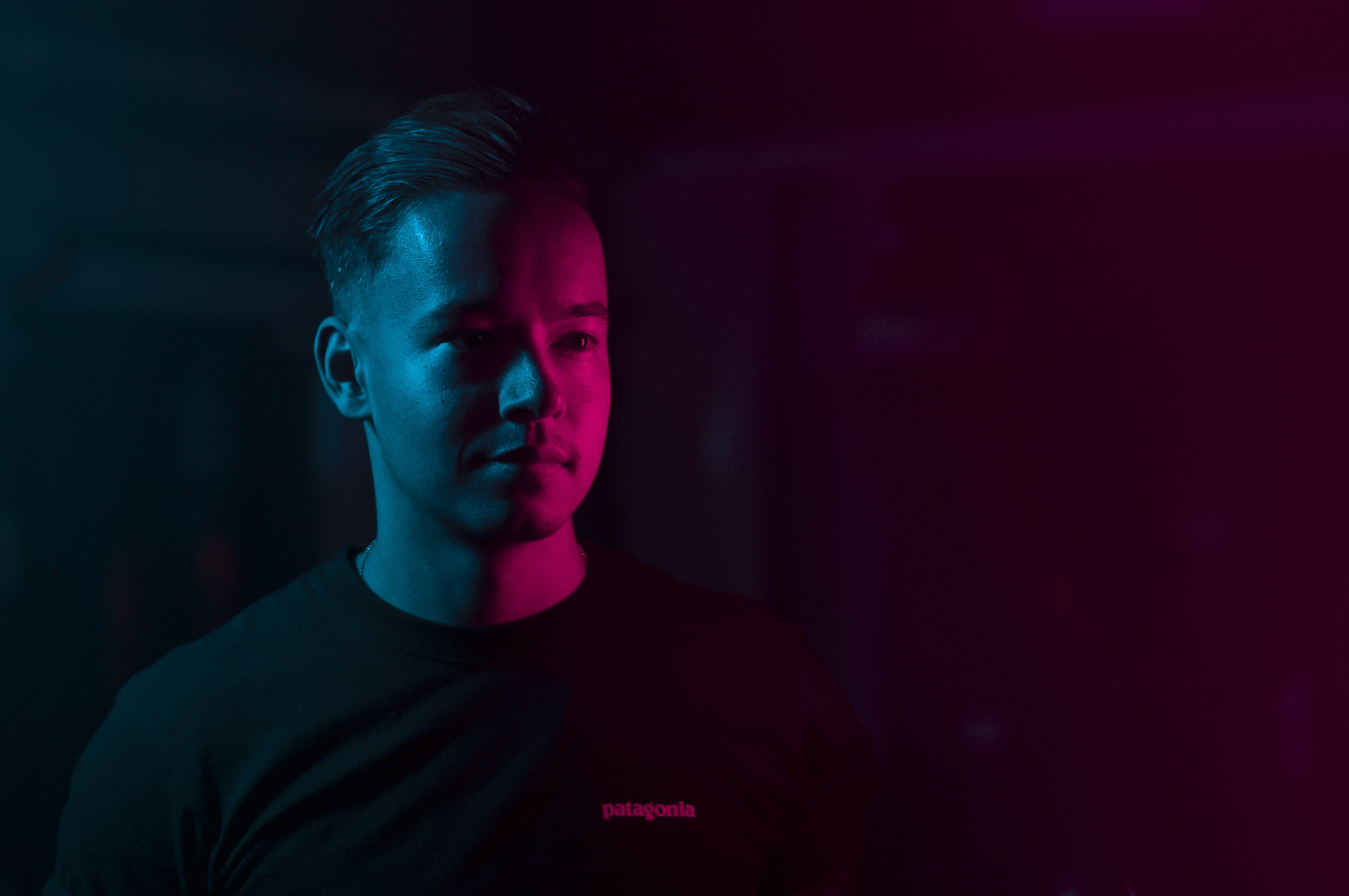 indoors, front view, young adult, glow, technology, close-up, red, young men, light, adult, lights, teenager, casual clothing, looking, man, look, human, HD Wallpaper