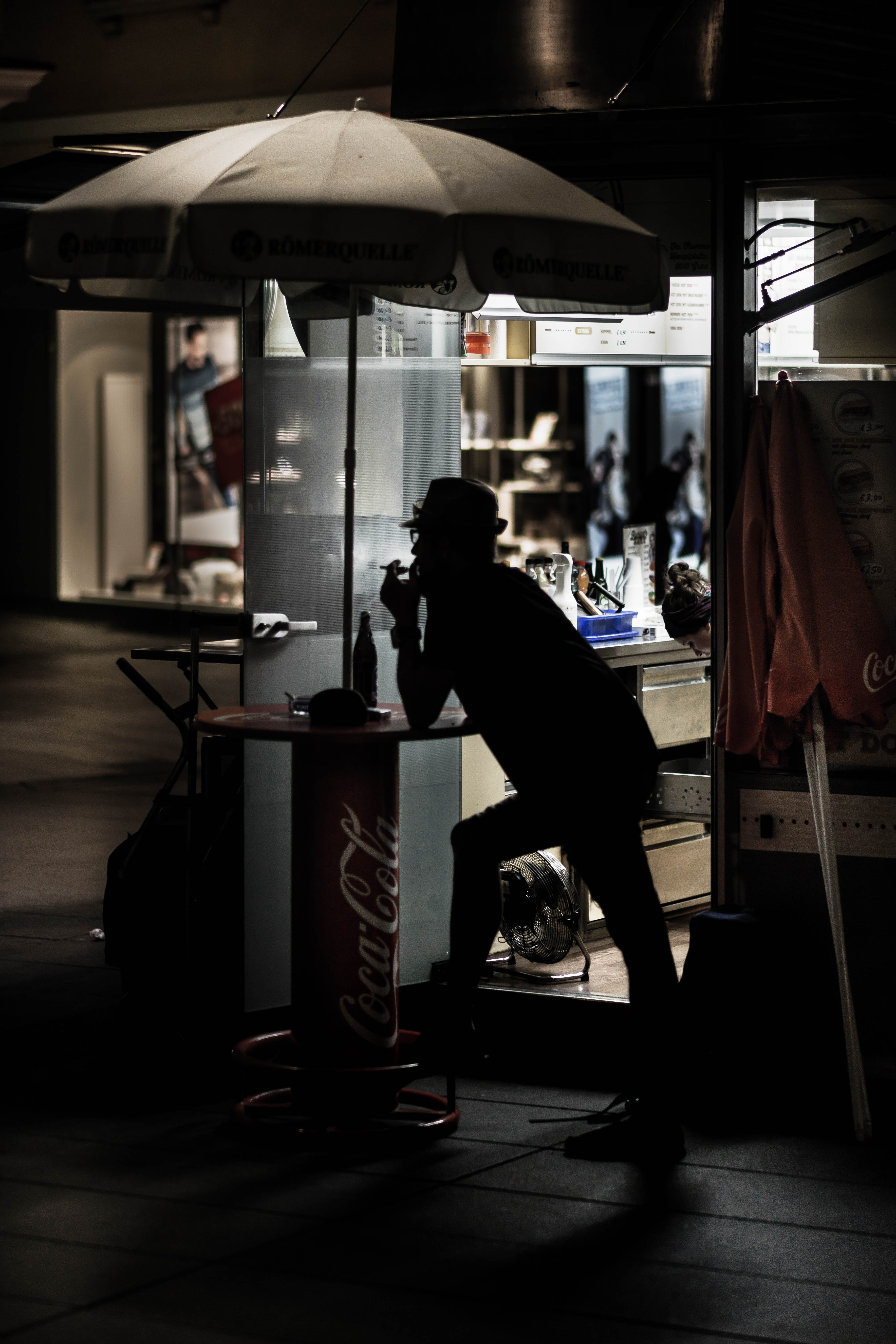 street, leaning, urban, real people, silhouette, leisure activity, men, adult, lifestyles, day, storefront, bending, city, table, full length, side view, Phone HD Wallpaper
