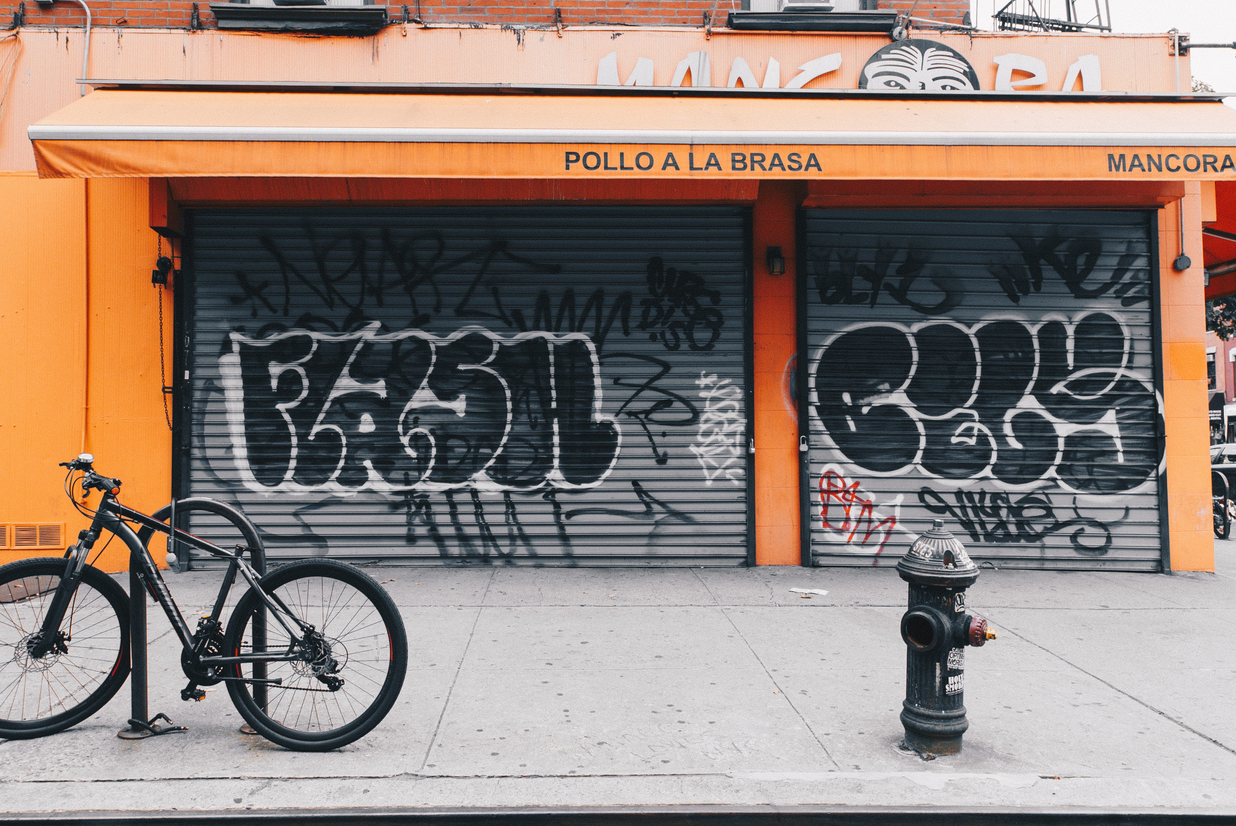 bicycle, graffiti, street art, outdoors, land vehicle, fire hydrant, near, hydrant, mode of transportation, fire, footpath, urban, building exterior, the big apple, HD Wallpaper