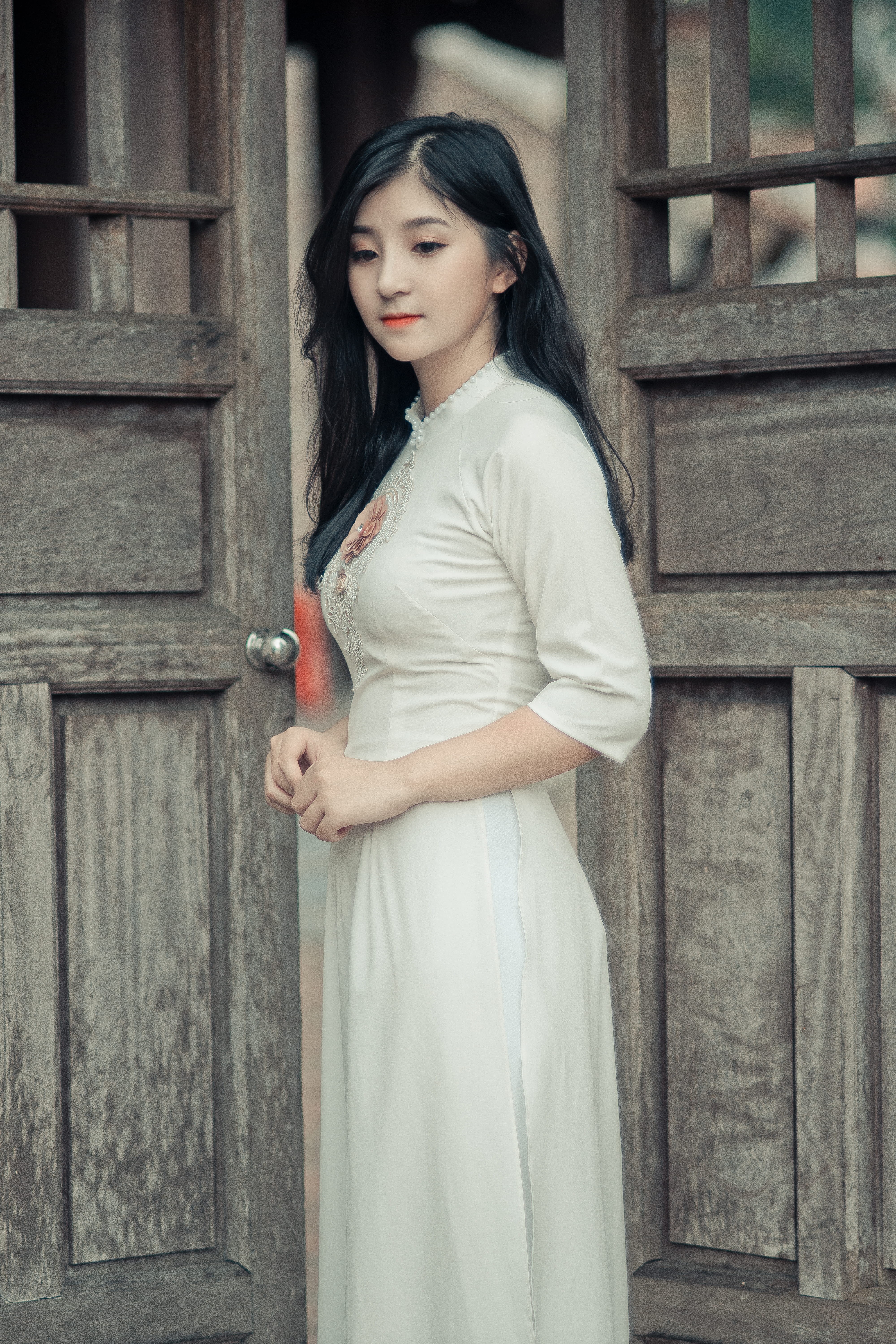 adult, wearing, girl, wooden, young women, pose, two, three quarter length, person, white dress, daytime, outdoors, hairstyle, 5K, brown, doorway, beautiful, Phone HD Wallpaper