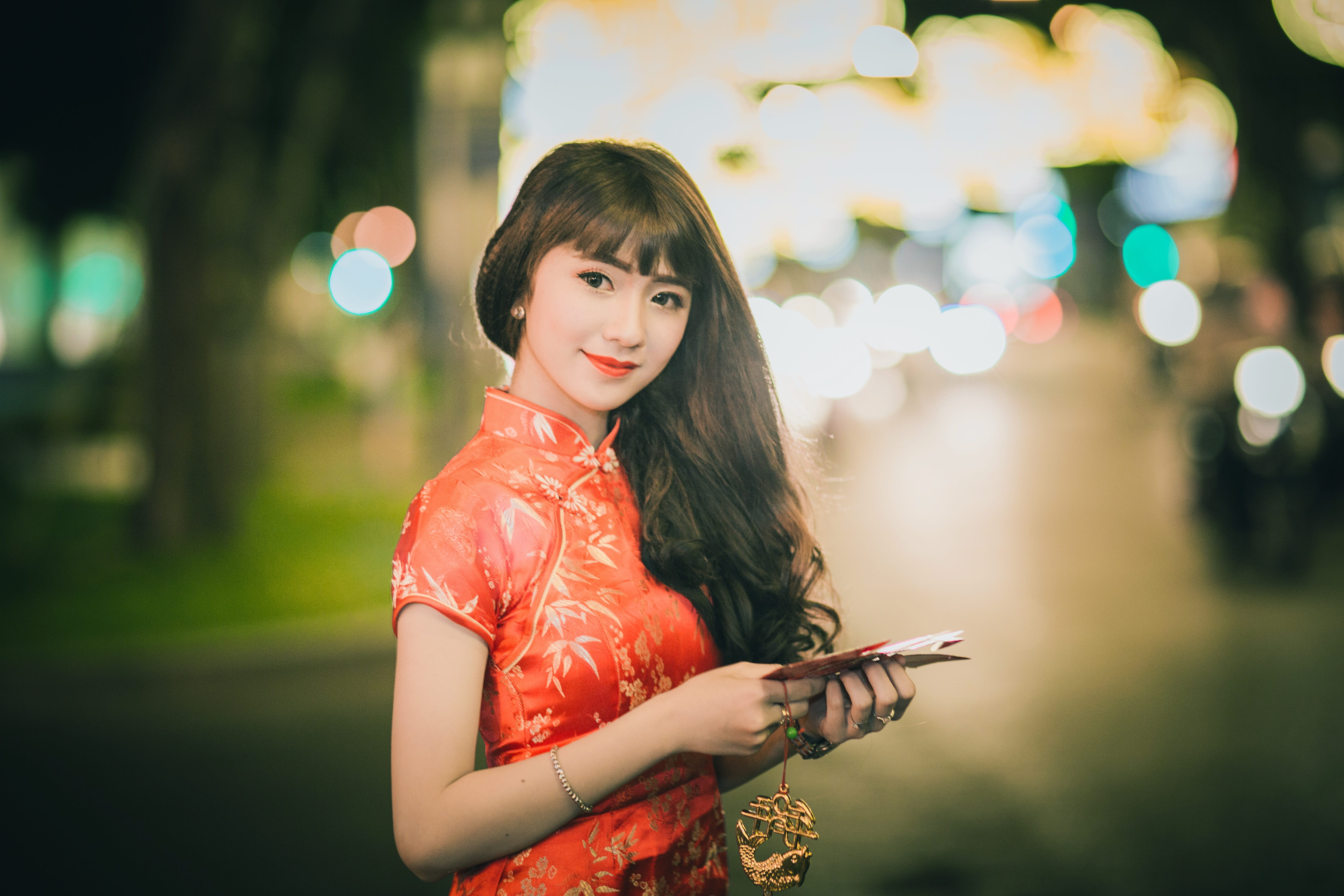 holding, traditional wear, fashion, style, smiling, joy, photoshoot, woman, portrait, young adult, person, pretty, blur, dress, red, looking at camera, HD Wallpaper
