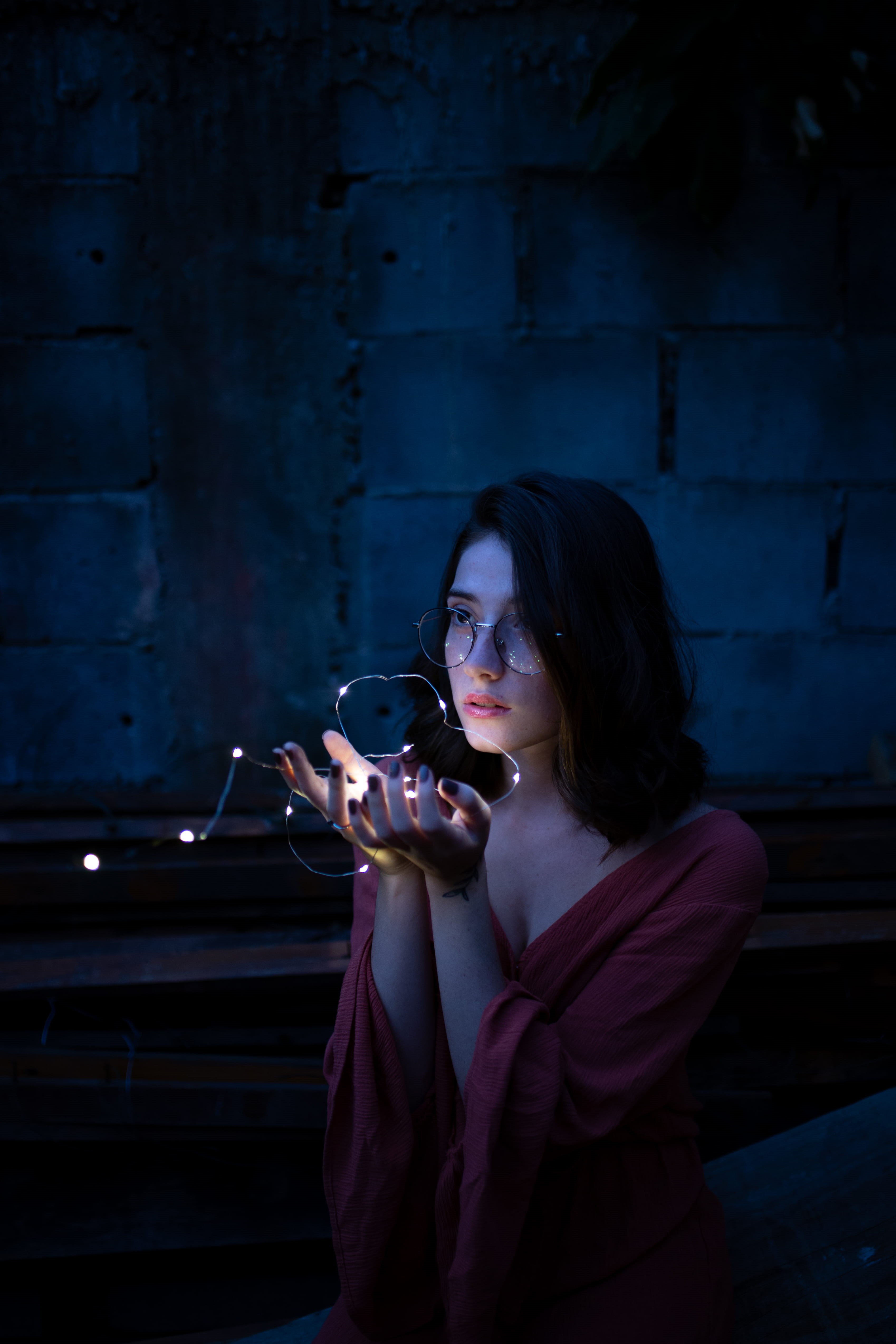 girl, casual clothing, night, young women, fashion, person, wall - building feature, wear, lights, hairstyle, leisure activity, beautiful, red, string lights, Phone HD Wallpaper
