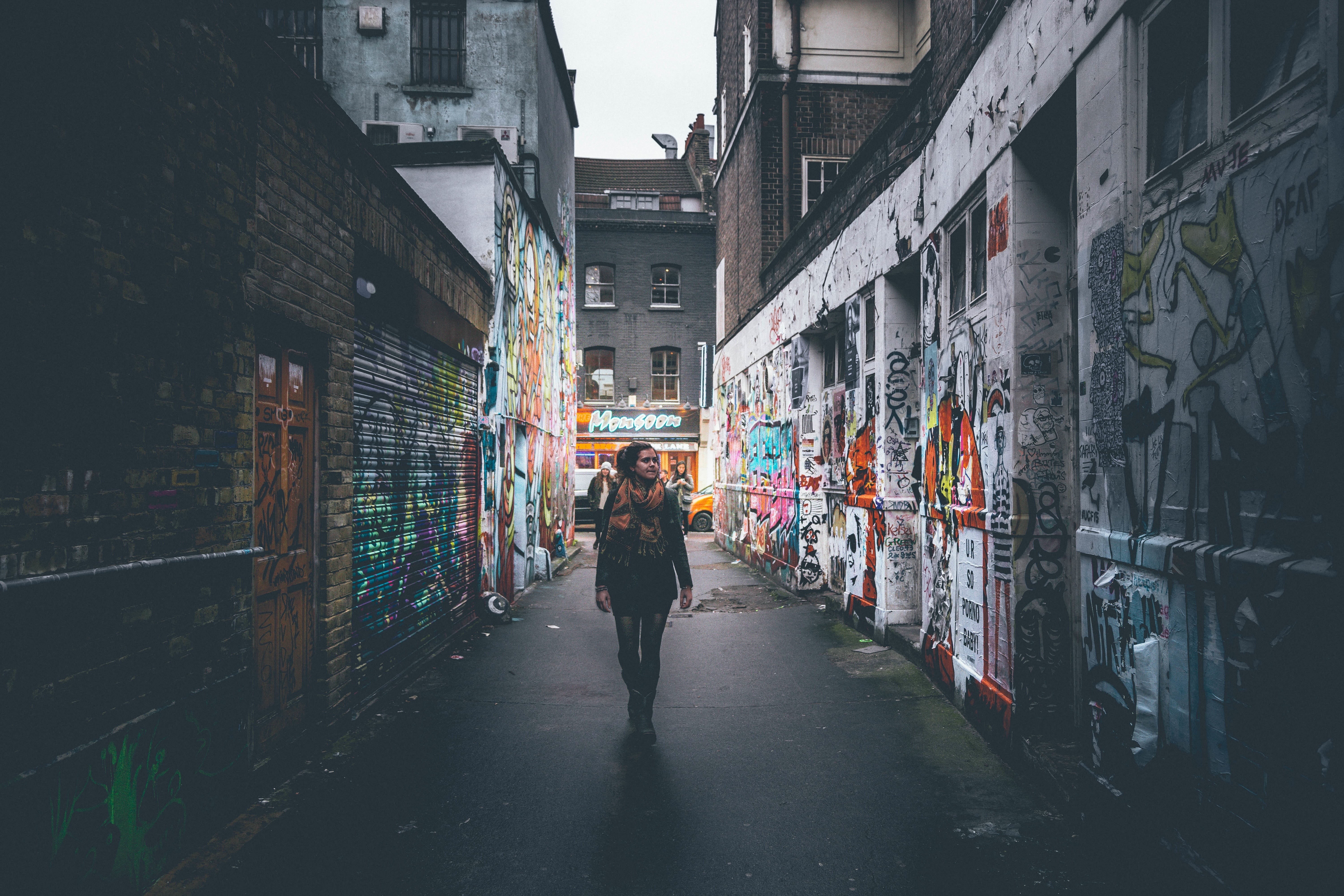 pants, daytime, coat, alley, the way forward, building exterior, woman, female, art, black, built structure, lifestyles, adult, people, outdoor, women, HD Wallpaper
